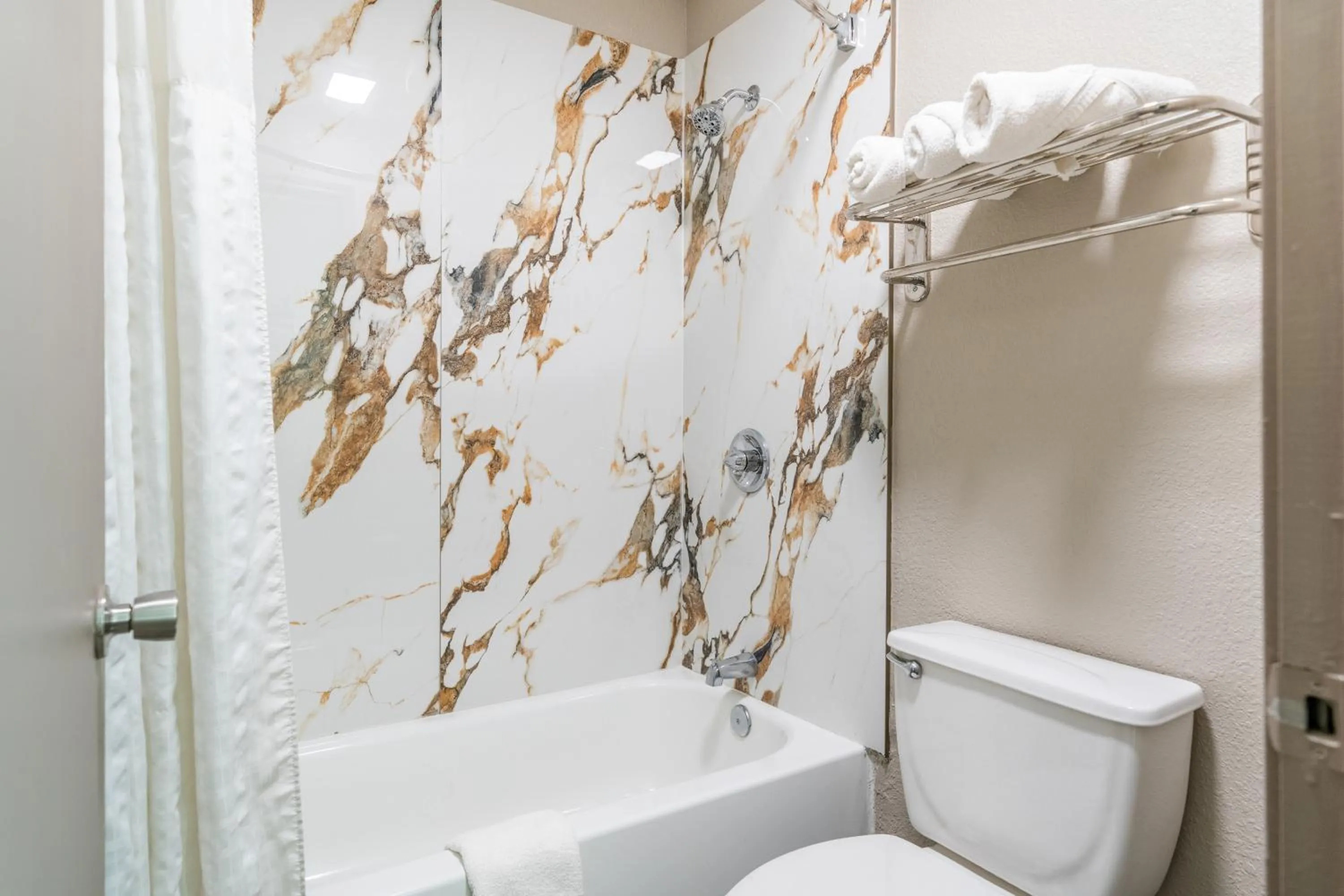 Bathroom in Super 8 by Wyndham San Antonio/Riverwalk Area