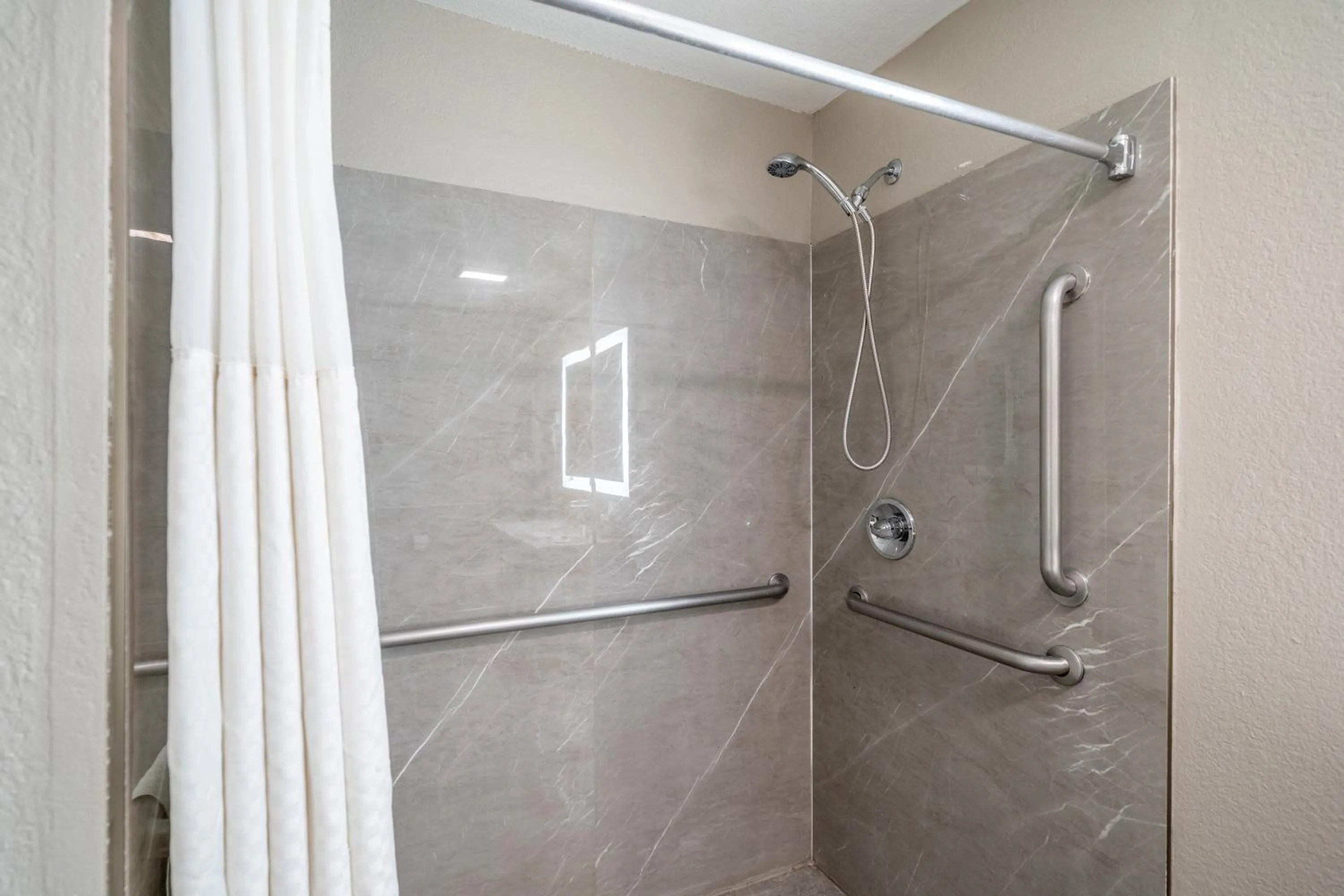 Shower in Super 8 by Wyndham San Antonio/Riverwalk Area