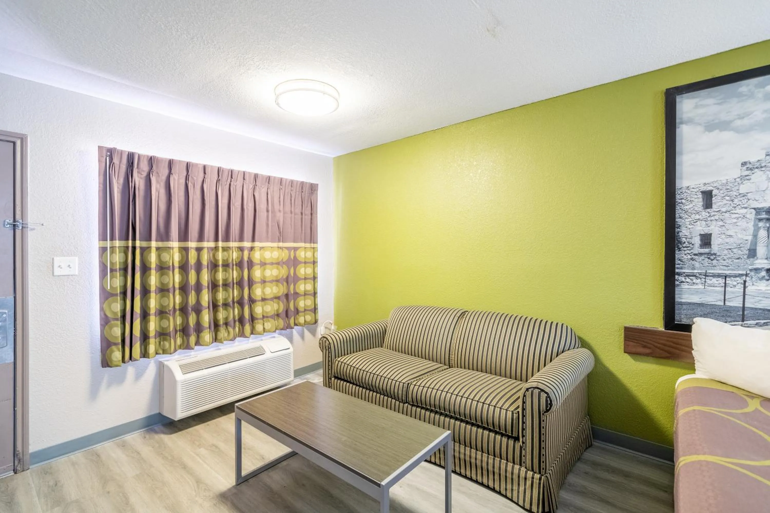 Seating area in Super 8 by Wyndham San Antonio/Riverwalk Area