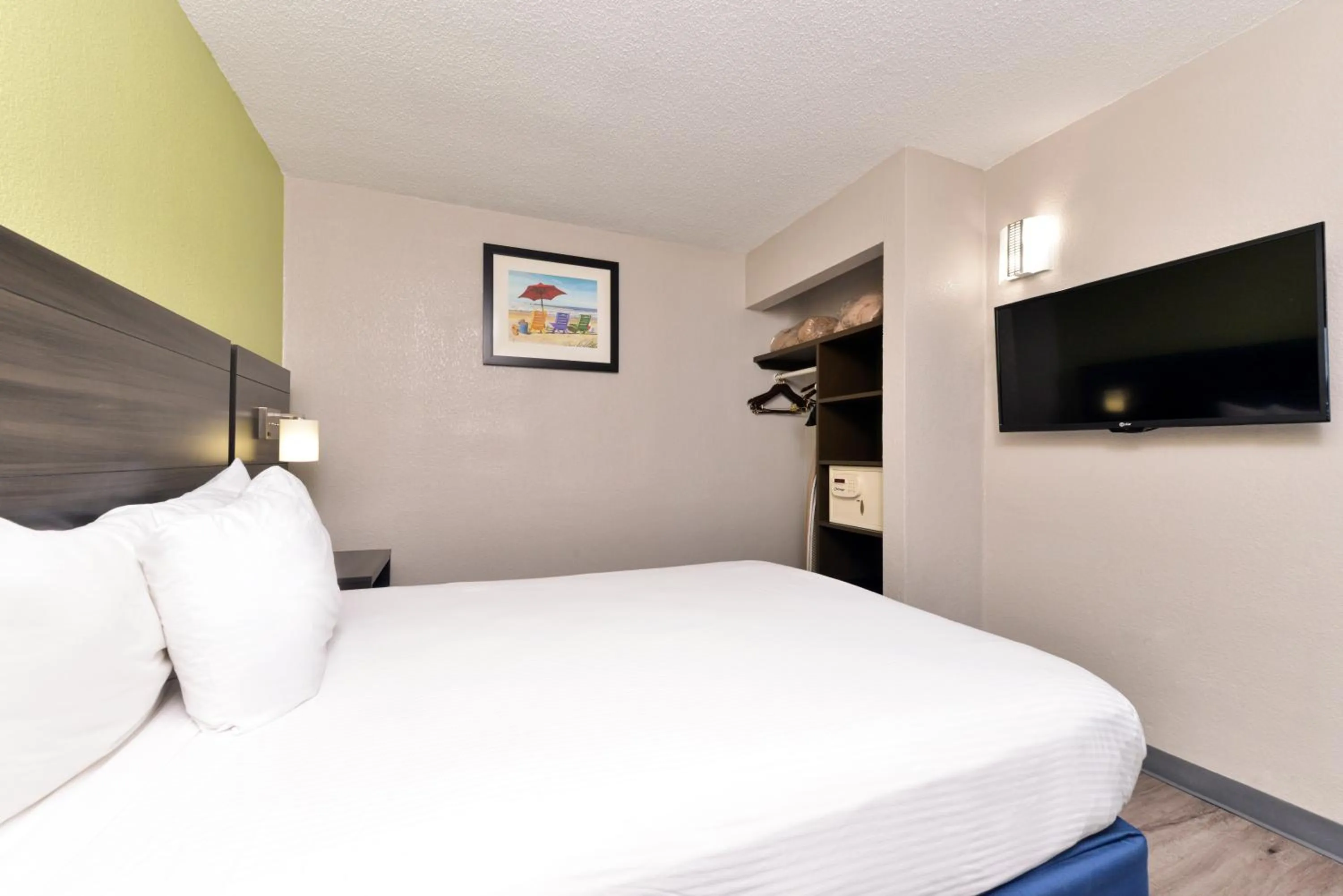 Bed in SureStay Studio by Best Western Virginia Beach Oceanfront