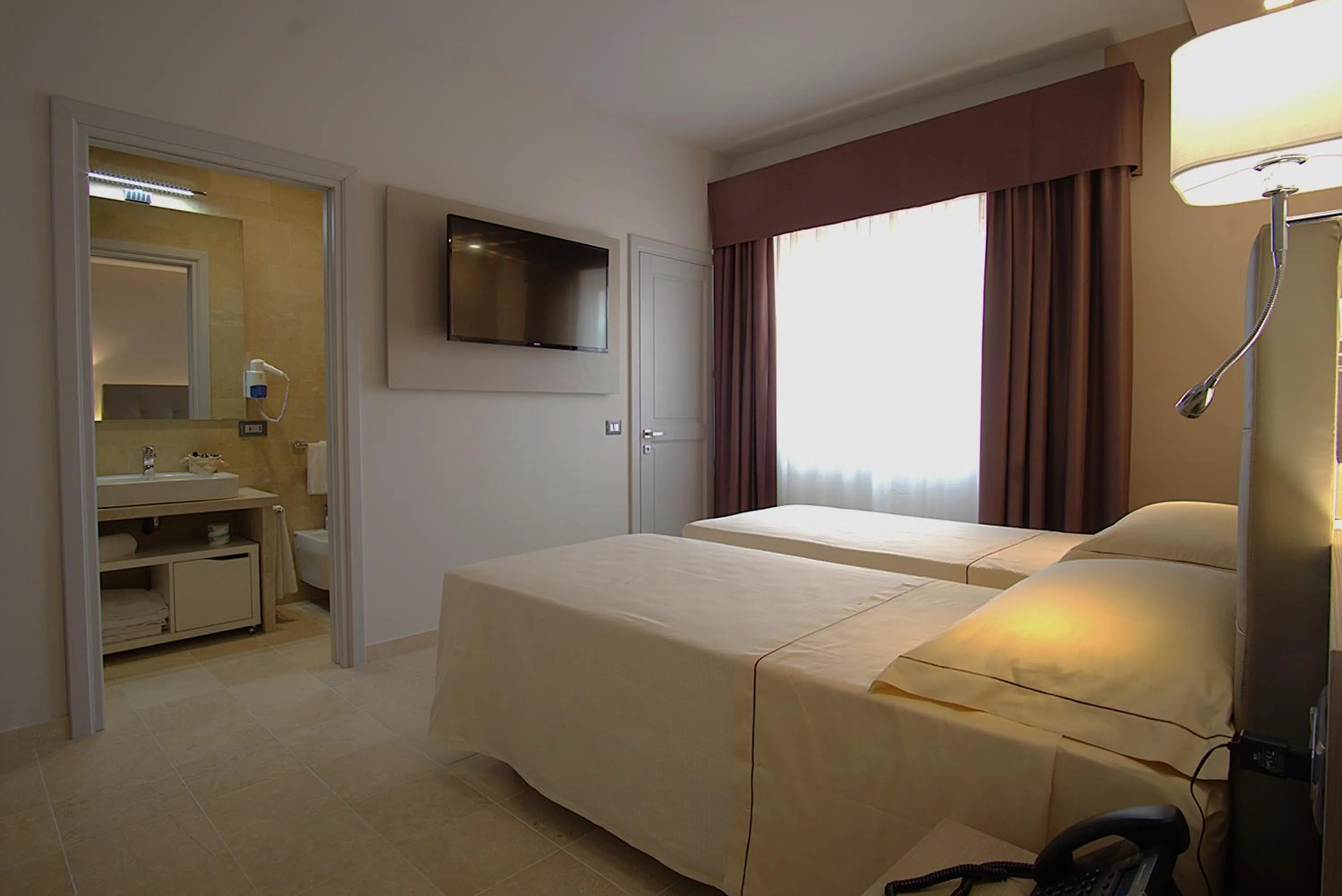 Bathroom, Bed in Netum Hotel