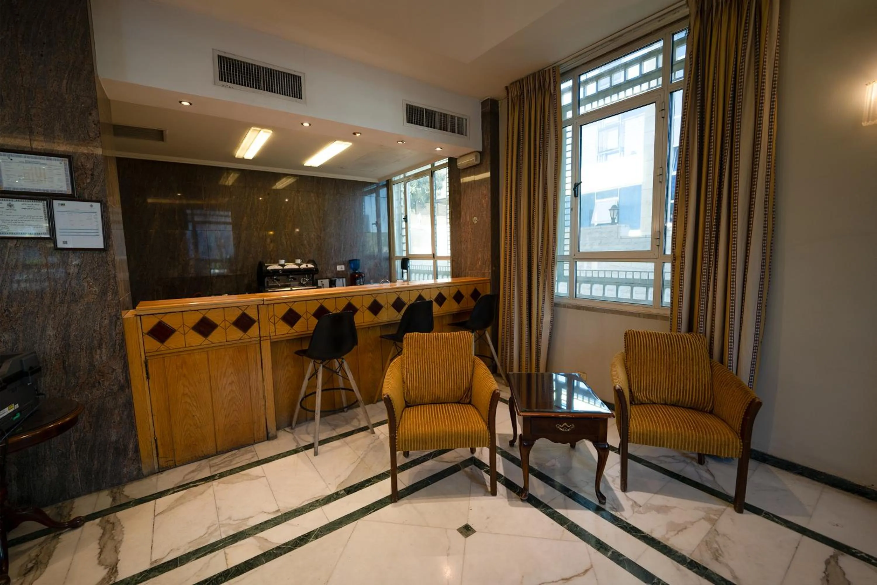 Lobby or reception in Kindi Suite Hotel