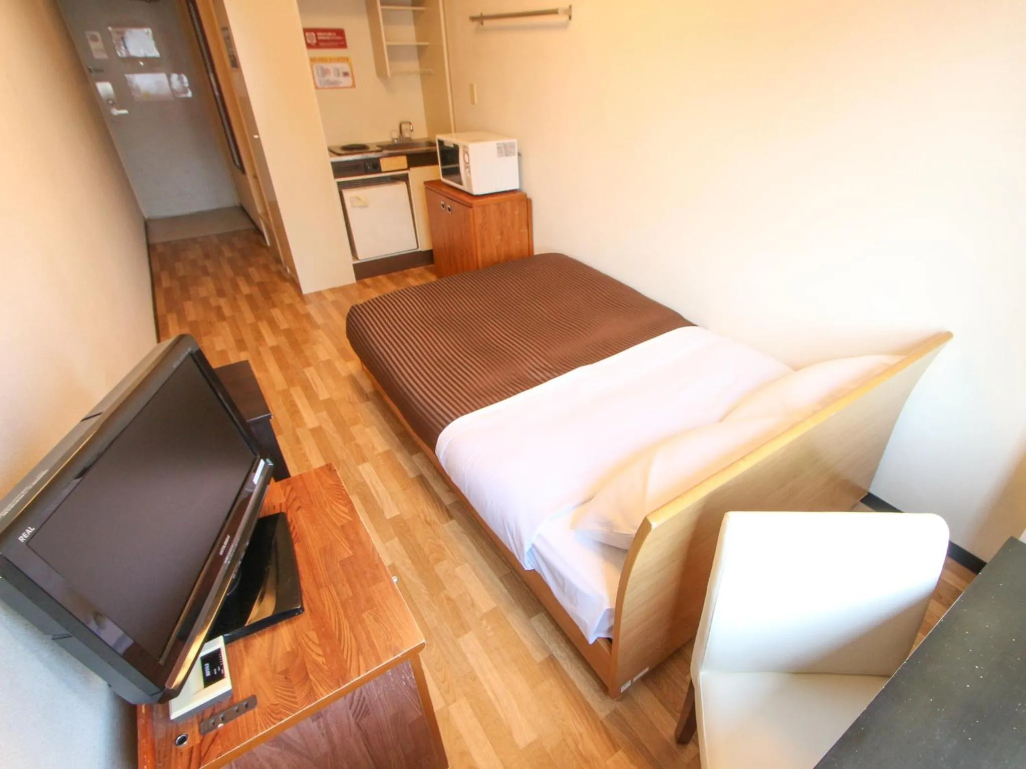 Bed in HOTEL LiVEMAX BUDGET Kawasaki Ekimae