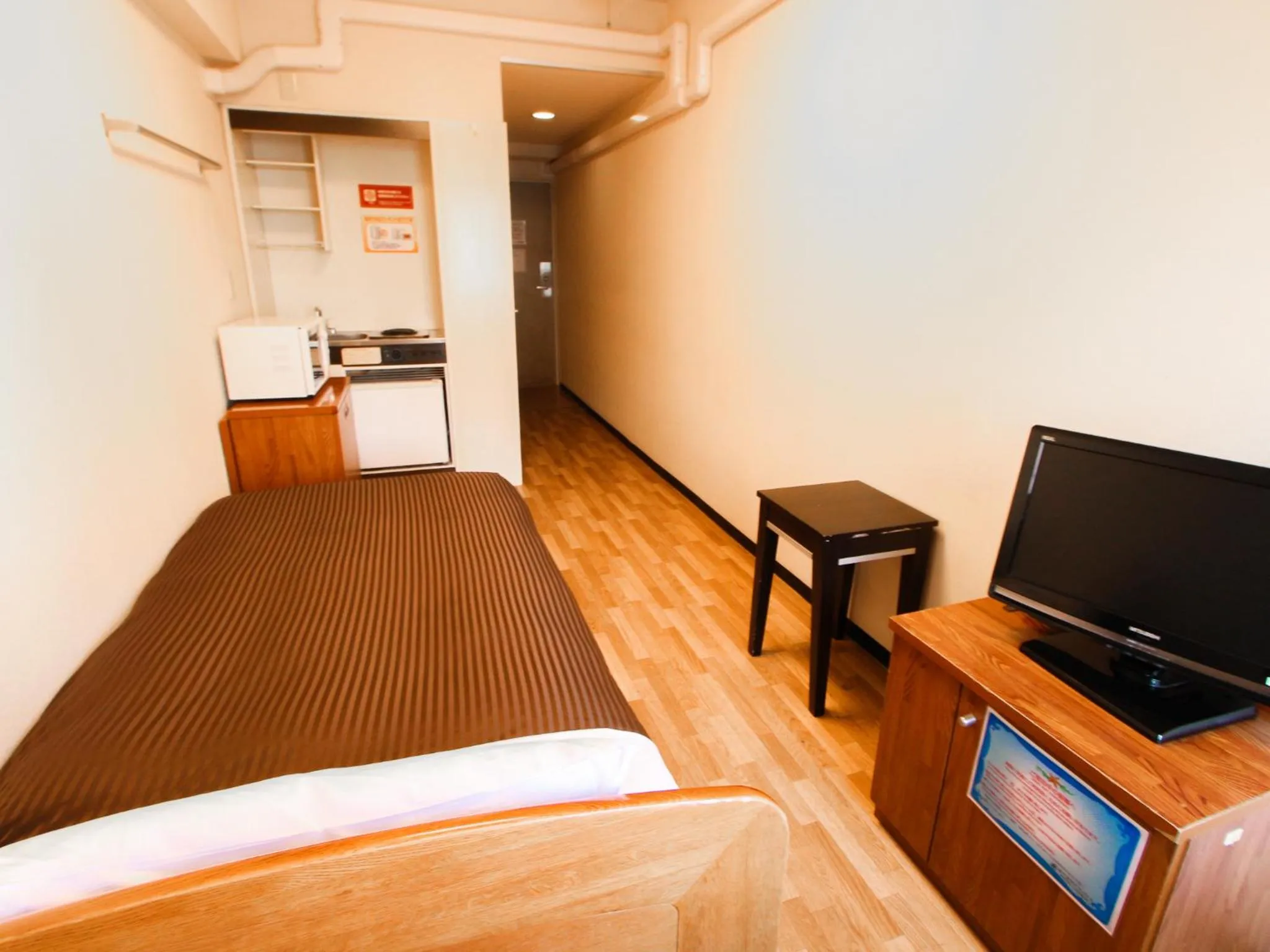 Bed in HOTEL LiVEMAX BUDGET Kawasaki Ekimae