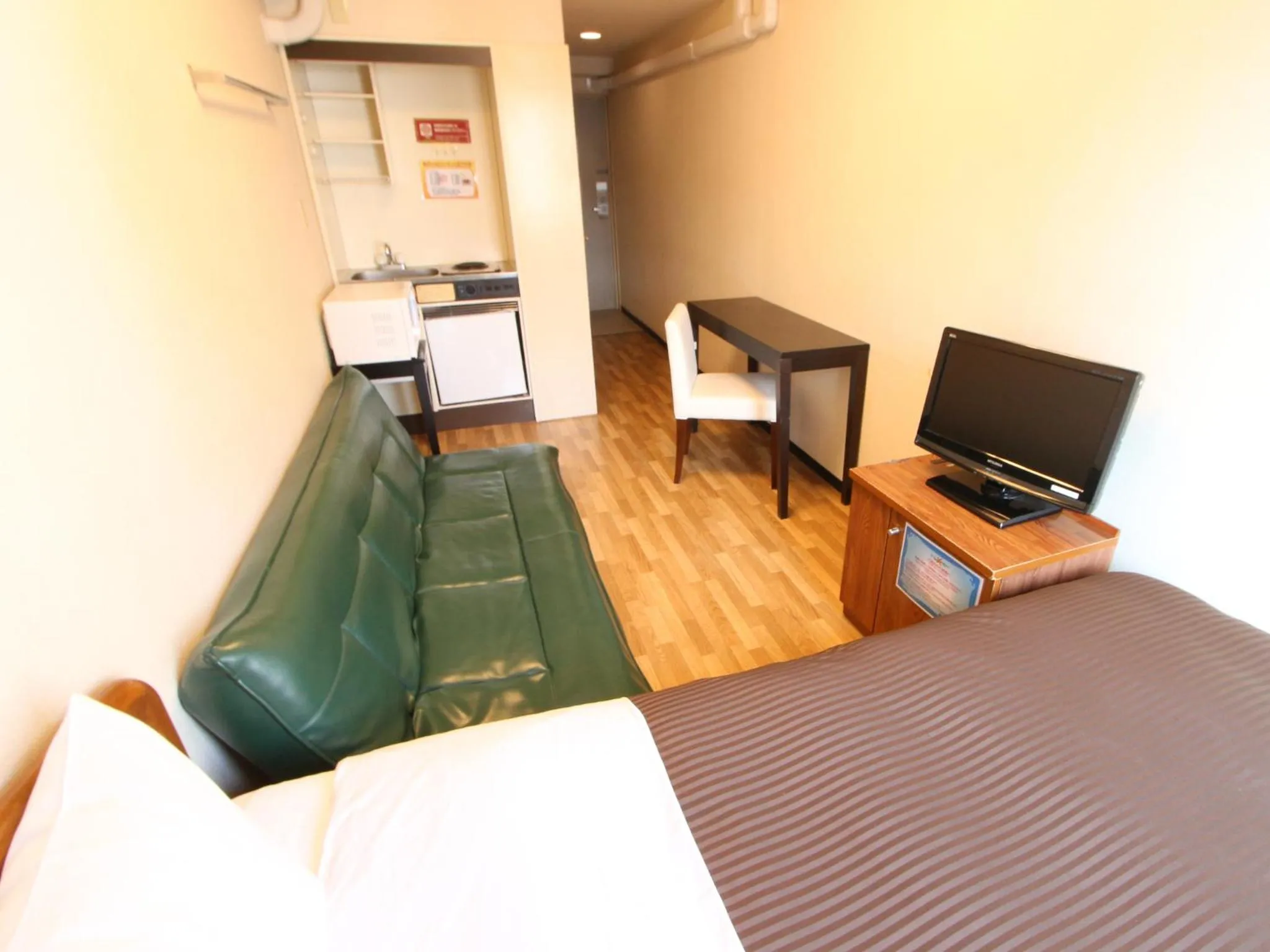 Bed in HOTEL LiVEMAX BUDGET Kawasaki Ekimae