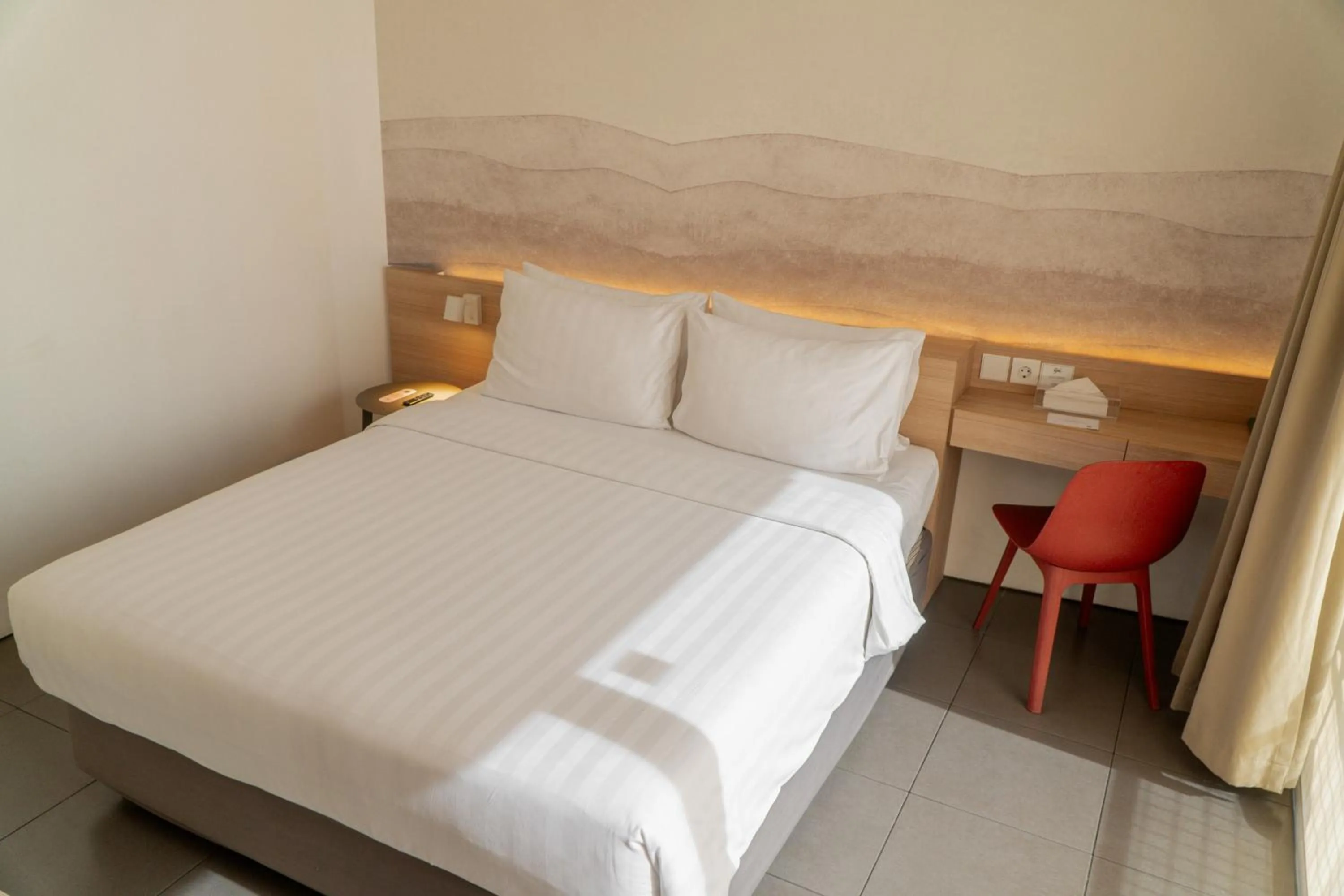 Bed in Malaka Hotel Bandung