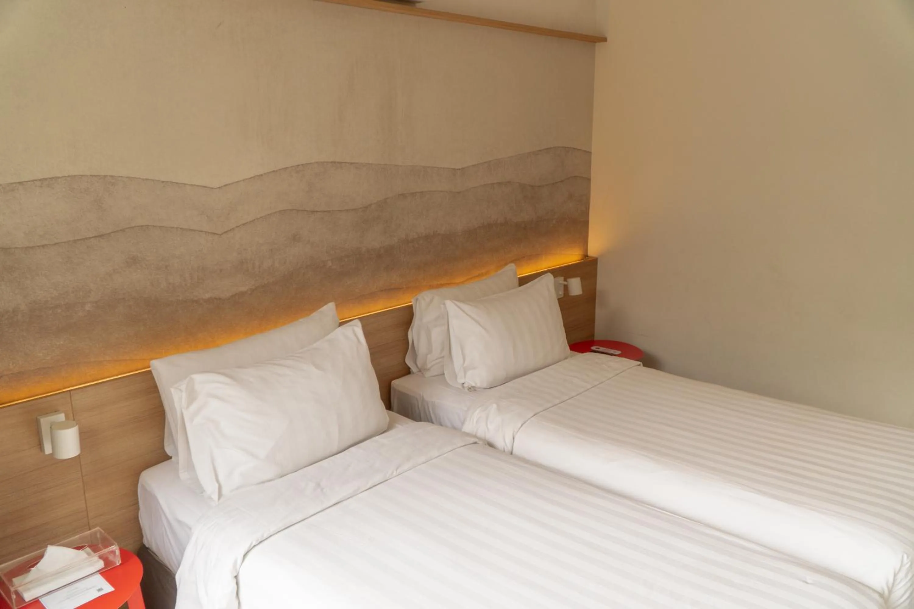 Bed in Malaka Hotel Bandung