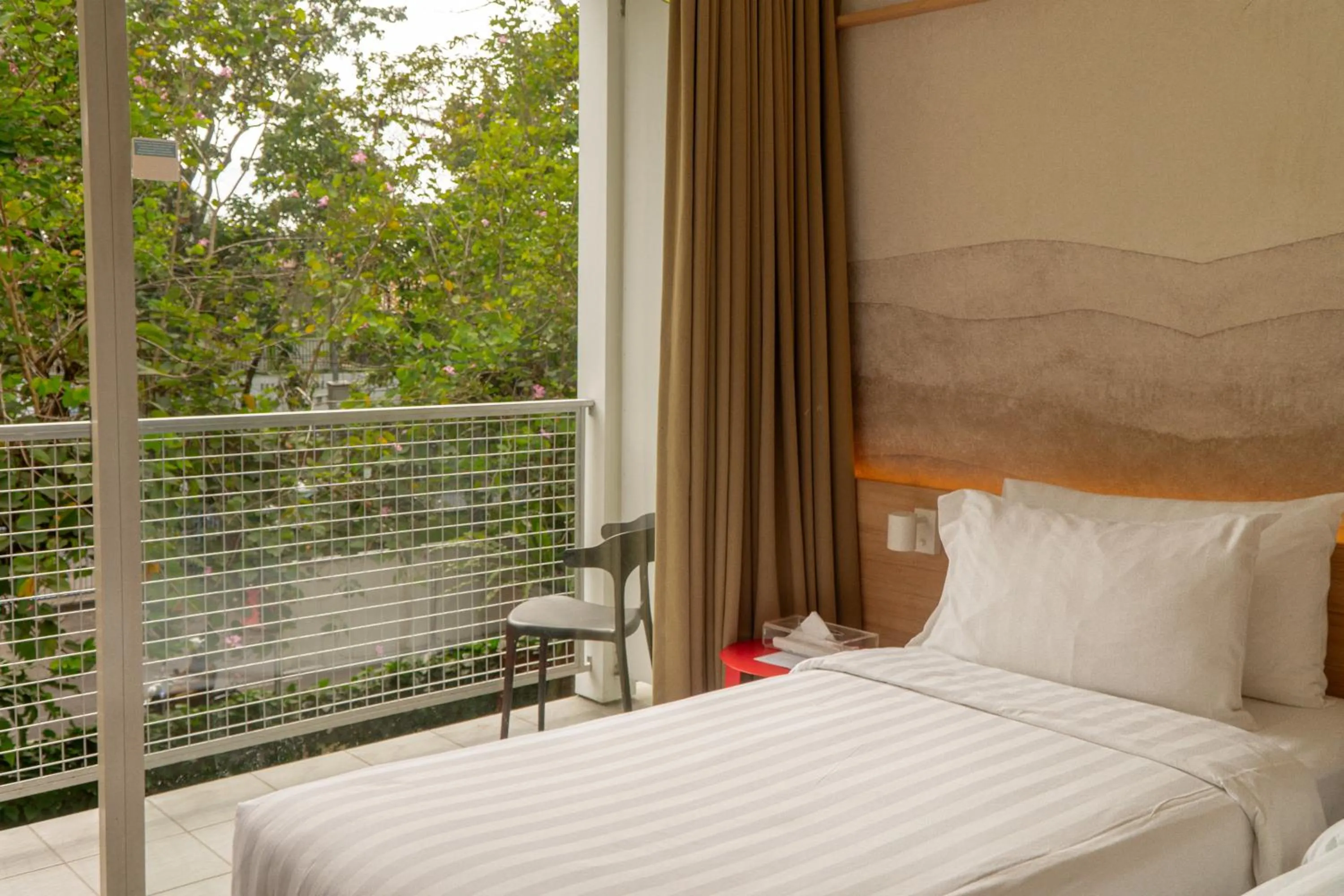 Bed in Malaka Hotel Bandung