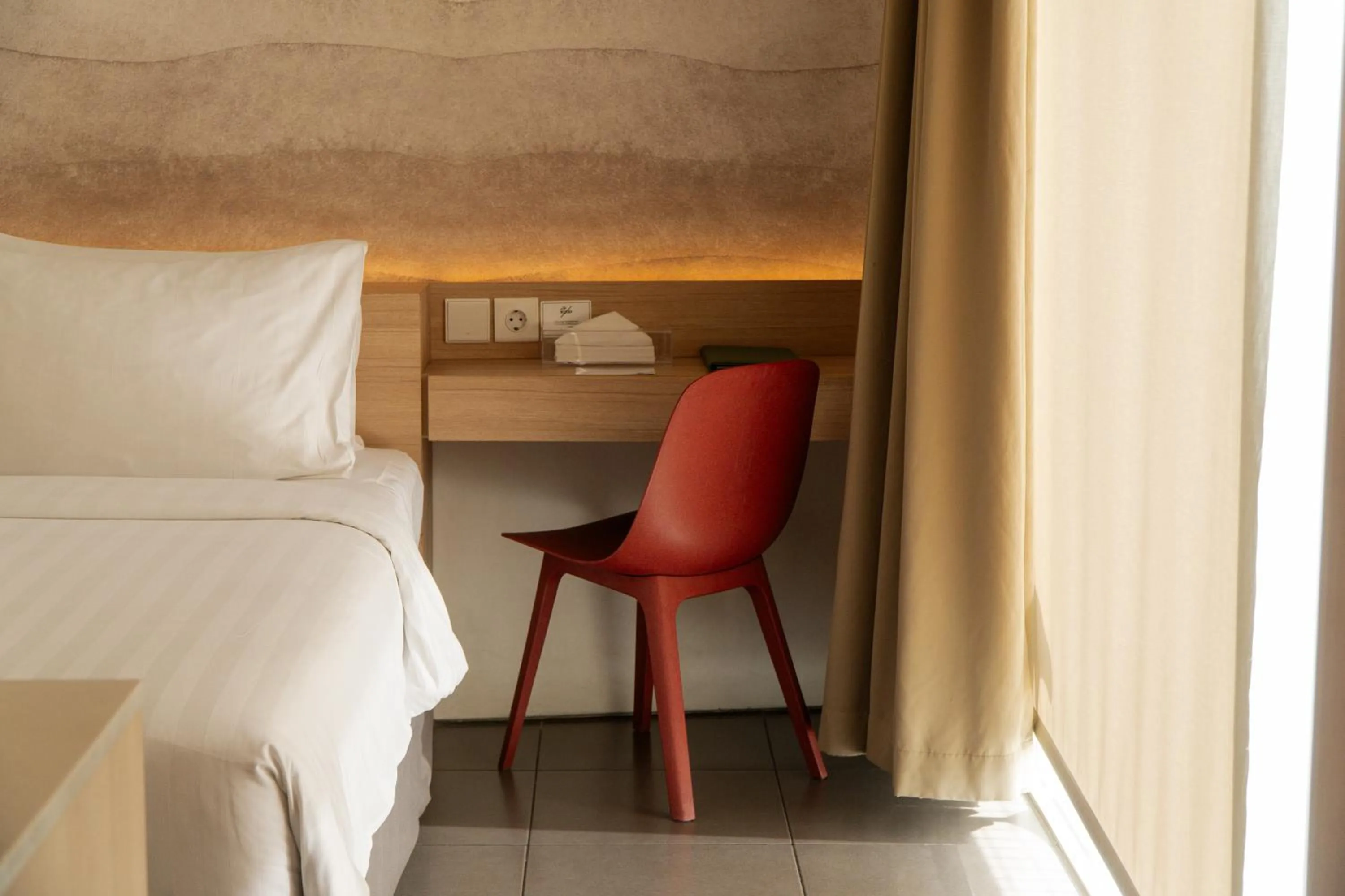 Bed in Malaka Hotel Bandung