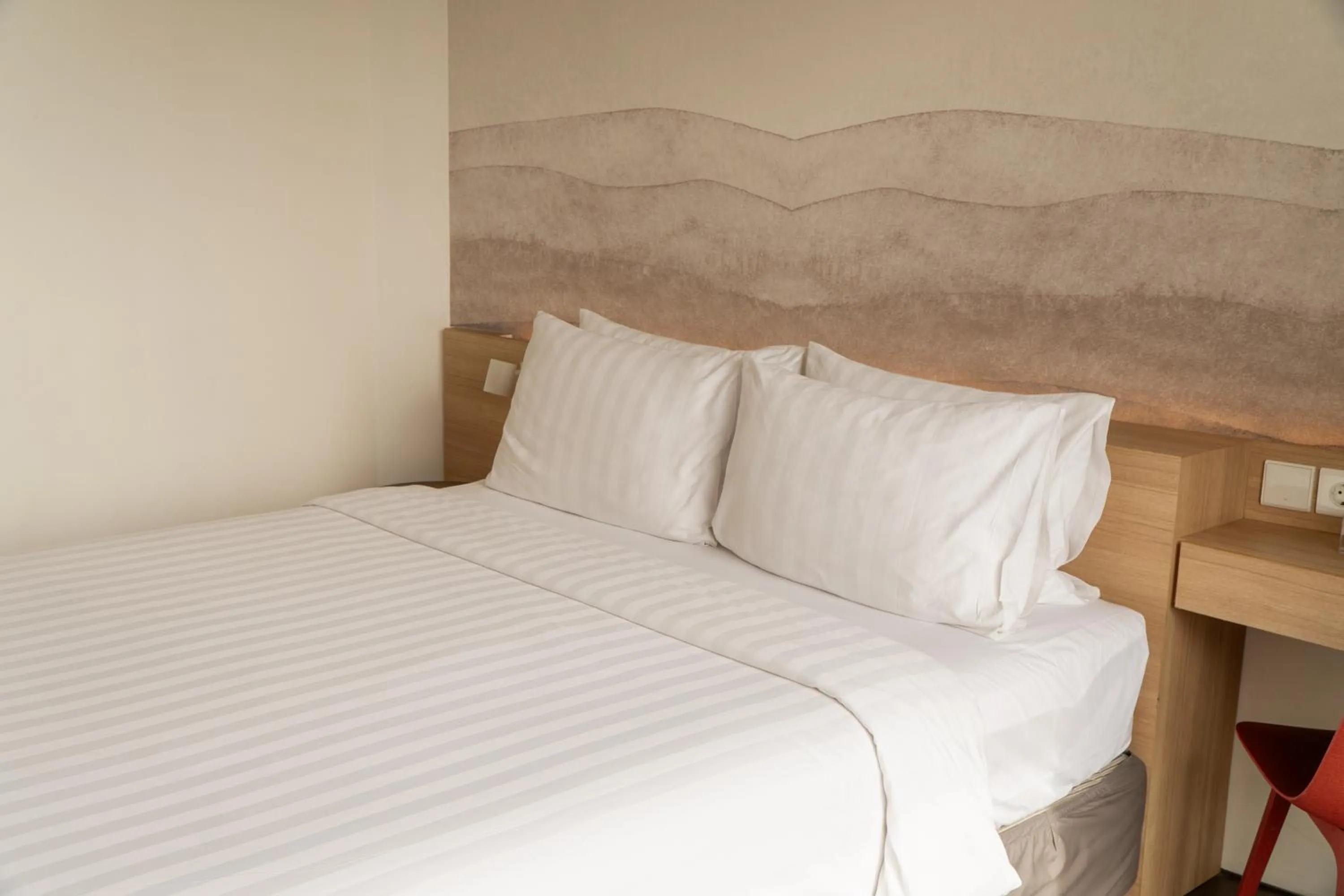 Bed in Malaka Hotel Bandung