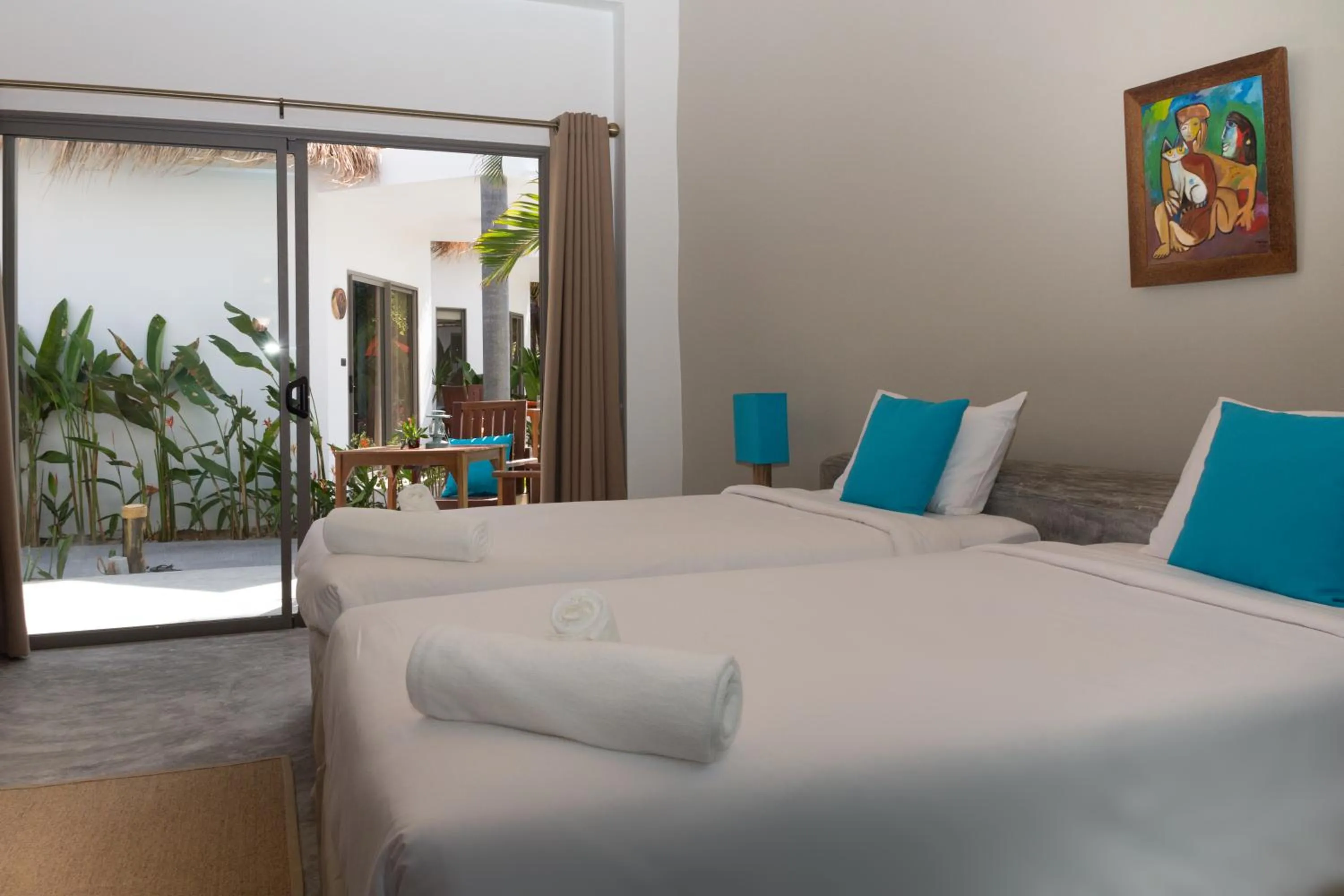 Bed in Secret Garden Beach Resort