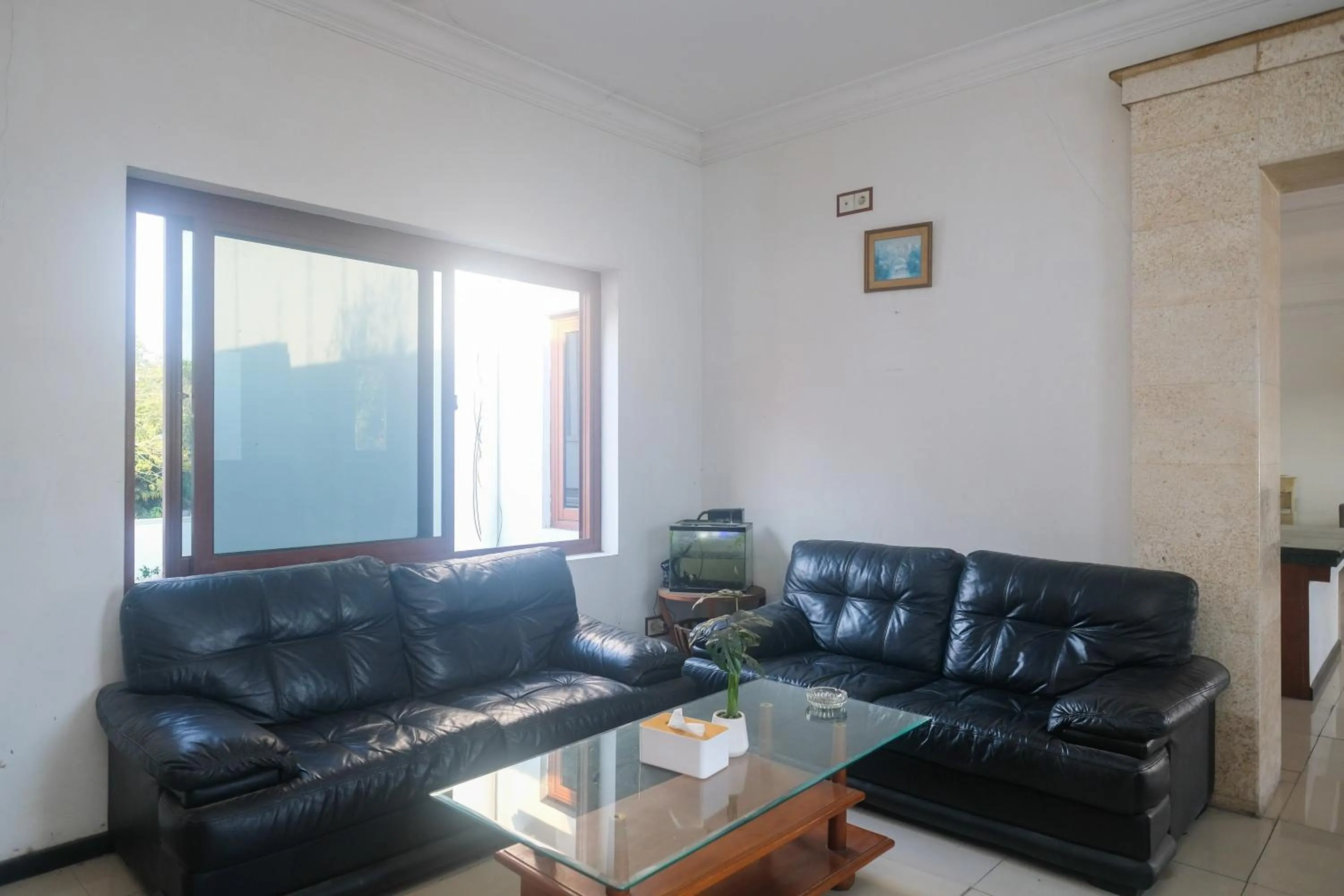 Seating area in Urbanview Omah Pari Boutique Hotel