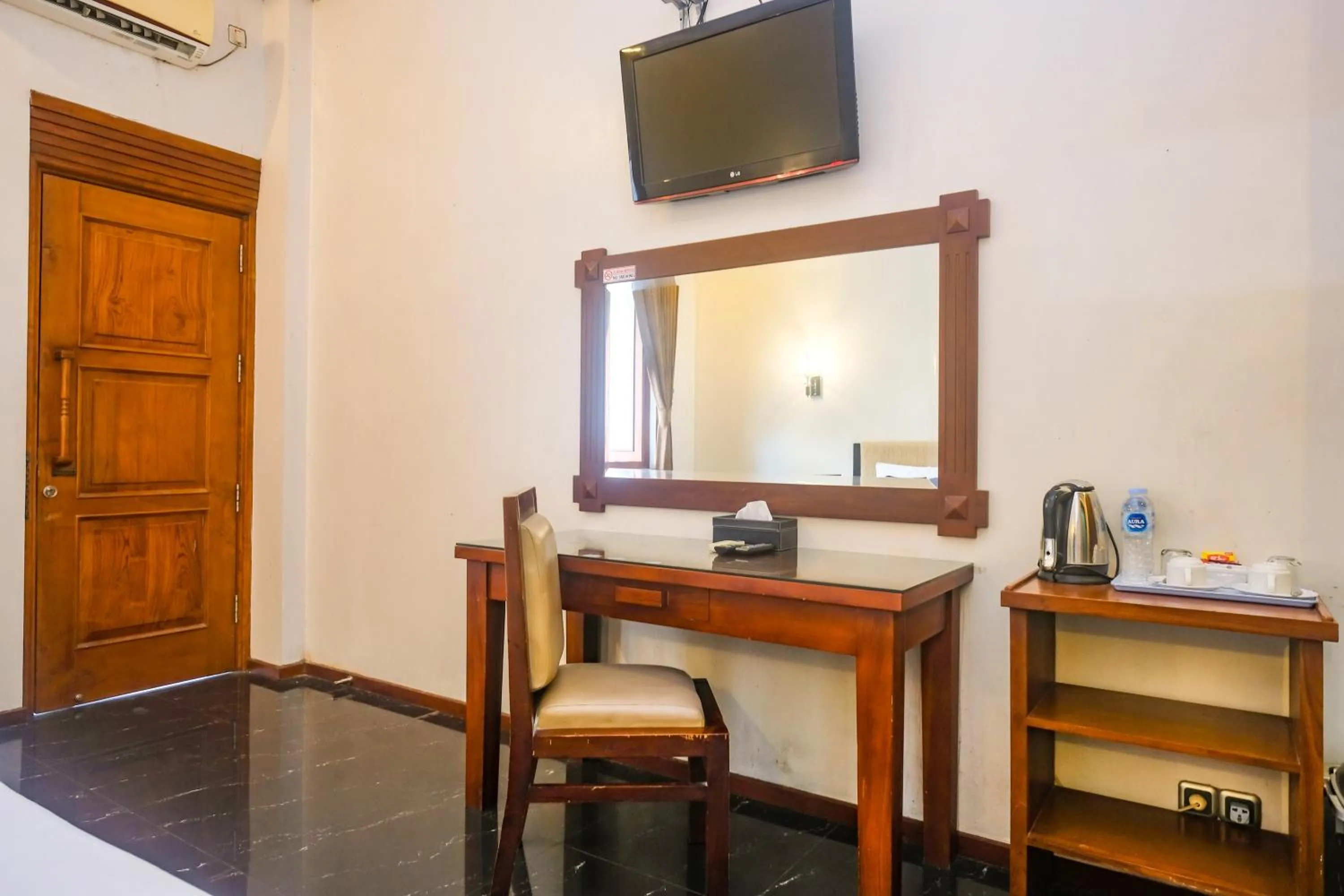 Bedroom in Urbanview Omah Pari Boutique Hotel