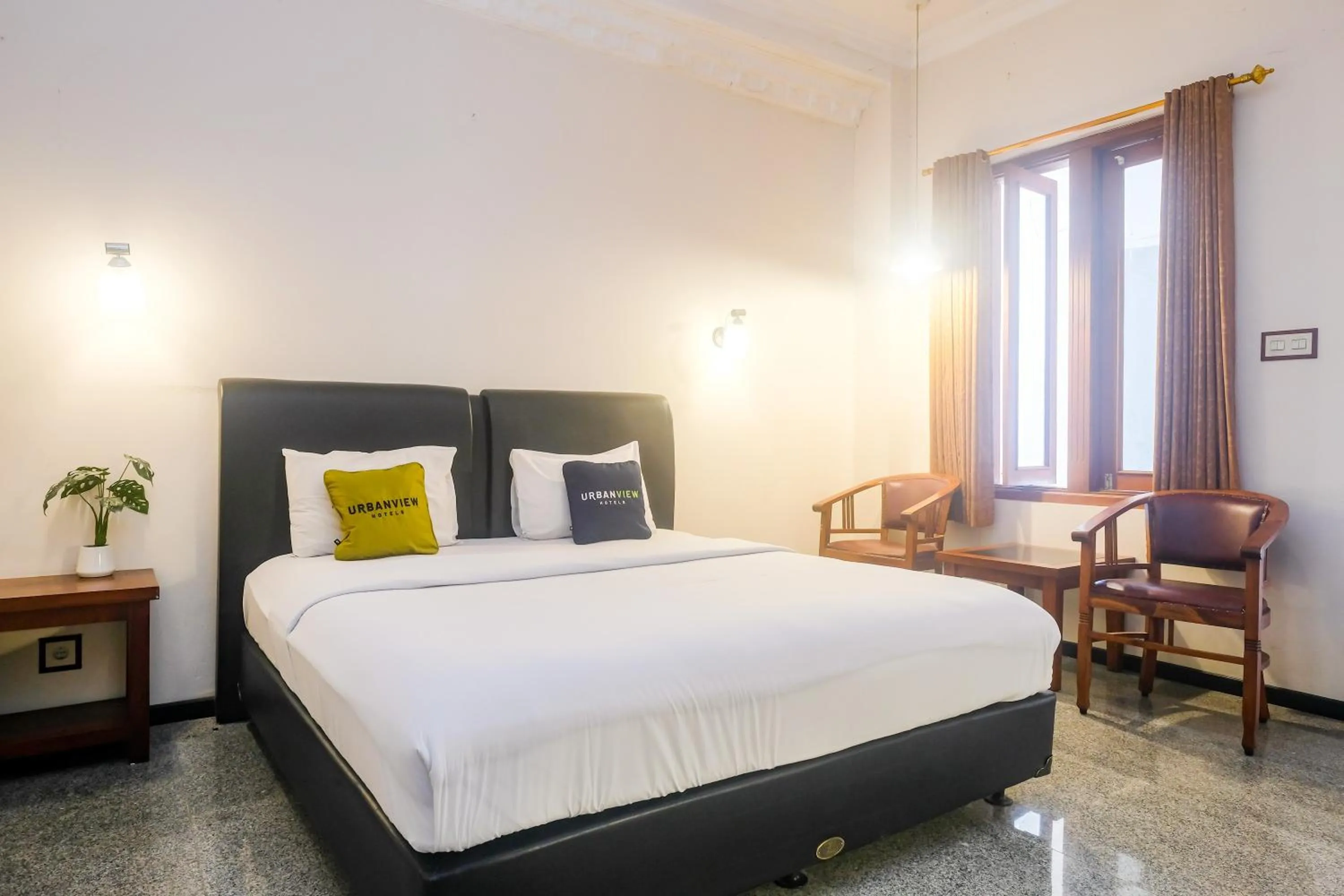 Bedroom, Bed in Urbanview Omah Pari Boutique Hotel