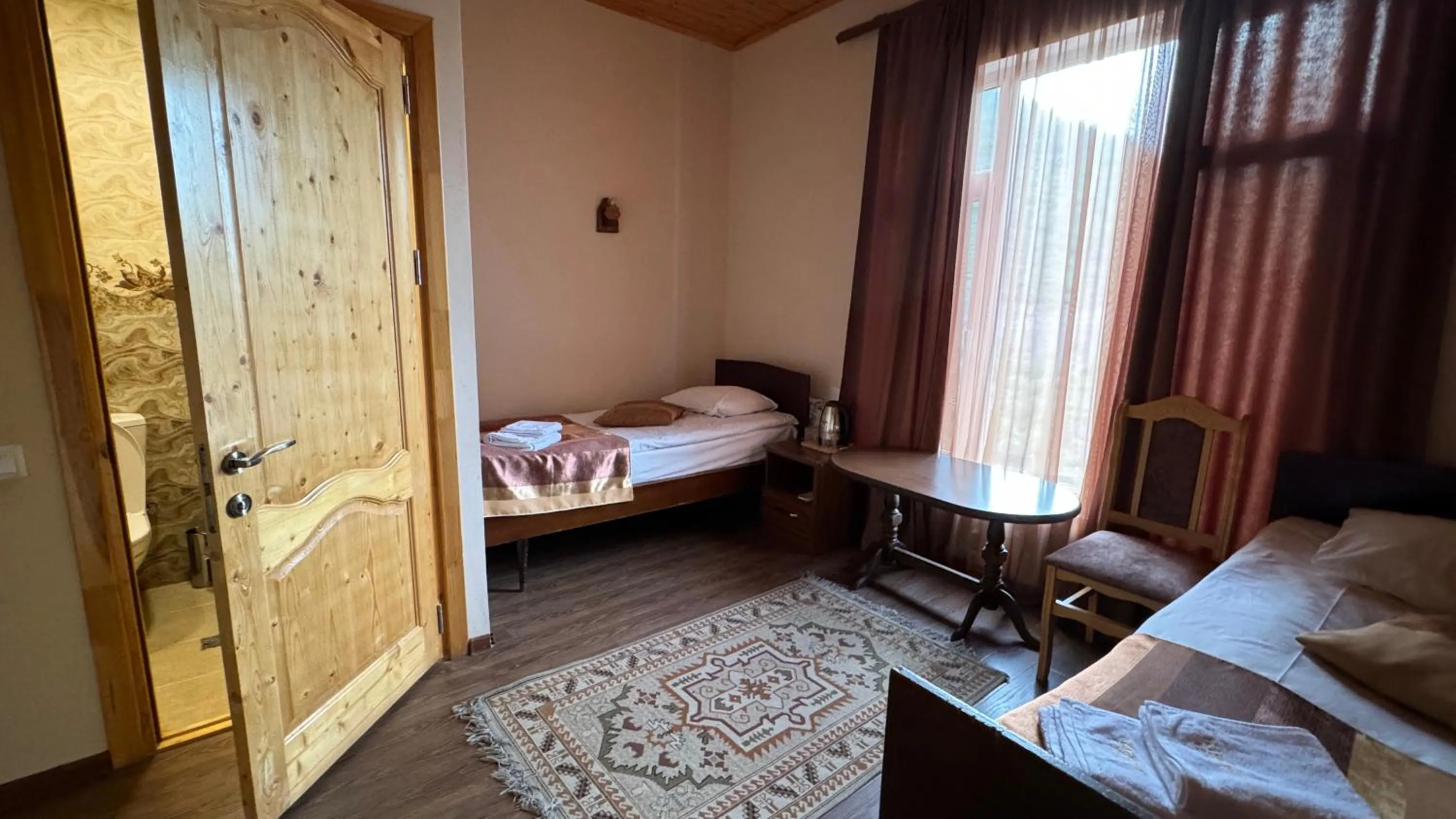 Photo of the whole room, Bed in Kirch Hotel & Restaurant