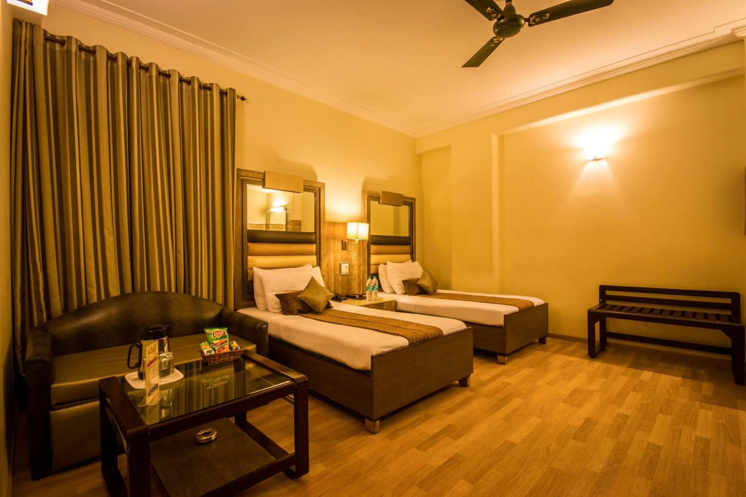 Photo of the whole room, Bed in The Suncourt Hotel Yatri