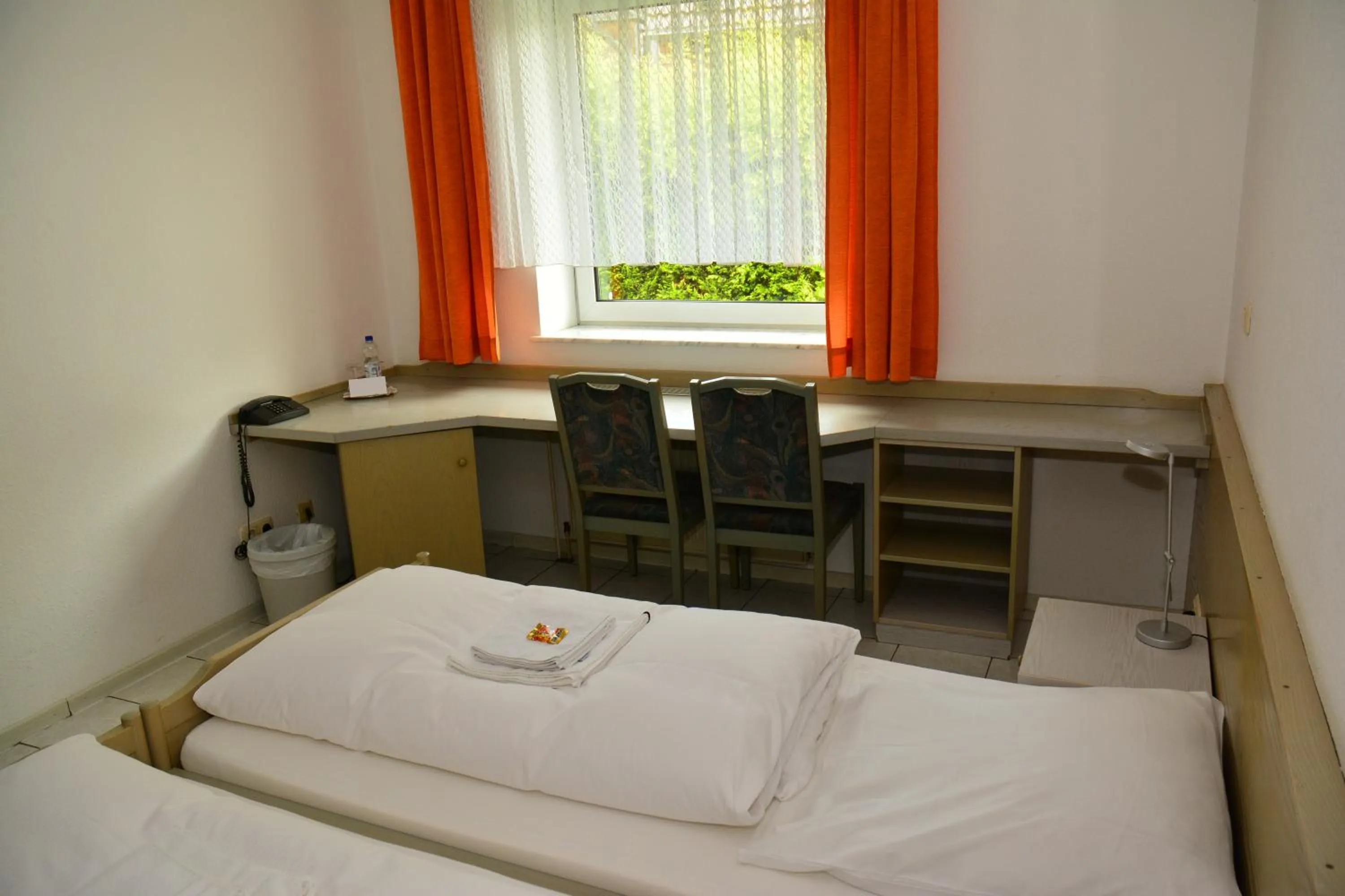 Photo of the whole room, Bed in Hotel Wilhelmshöhe