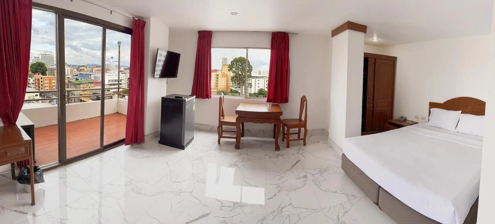 Bed in Highfive Hotel Pattaya