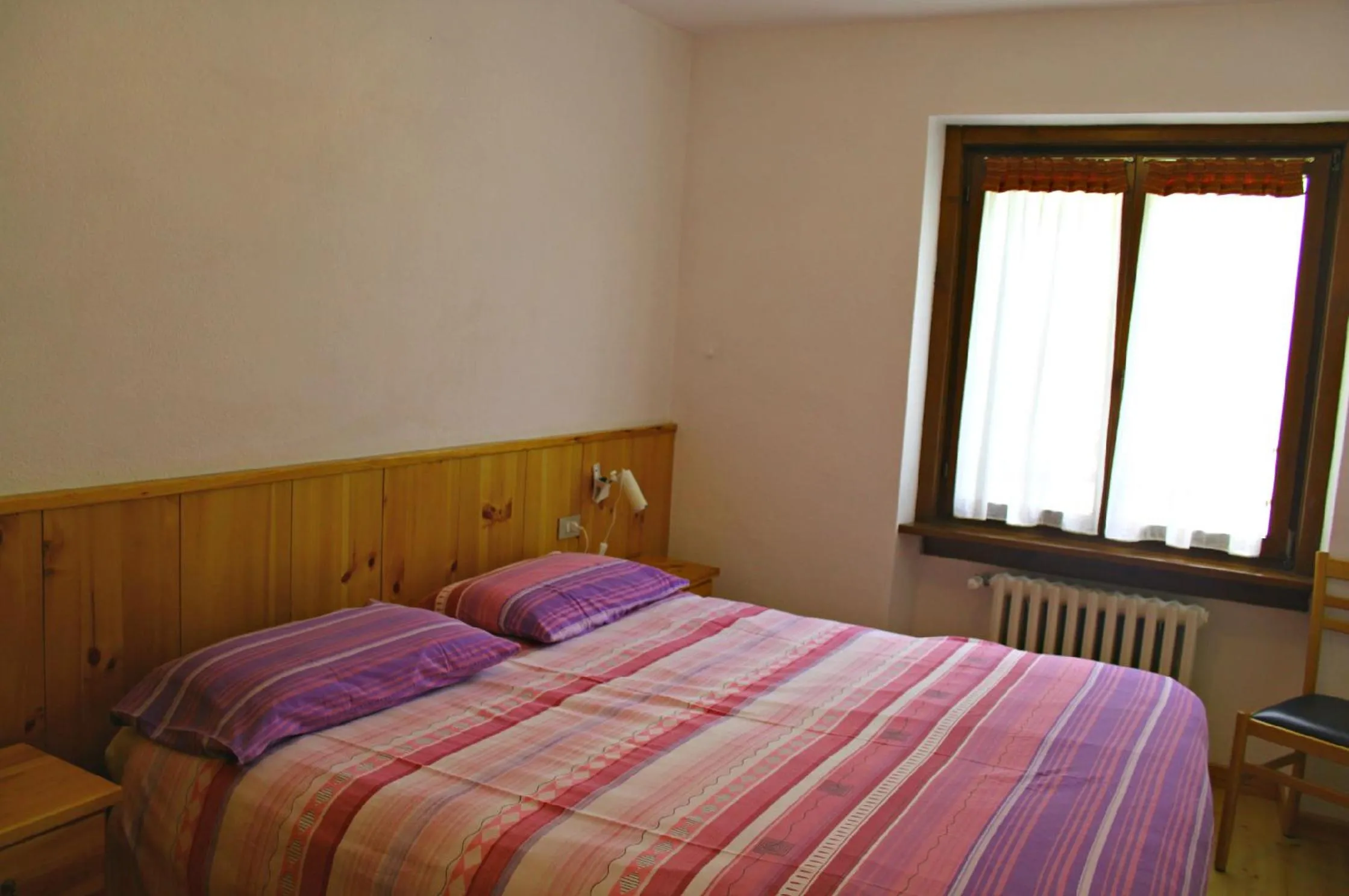 Photo of the whole room, Bed in Albergo K2