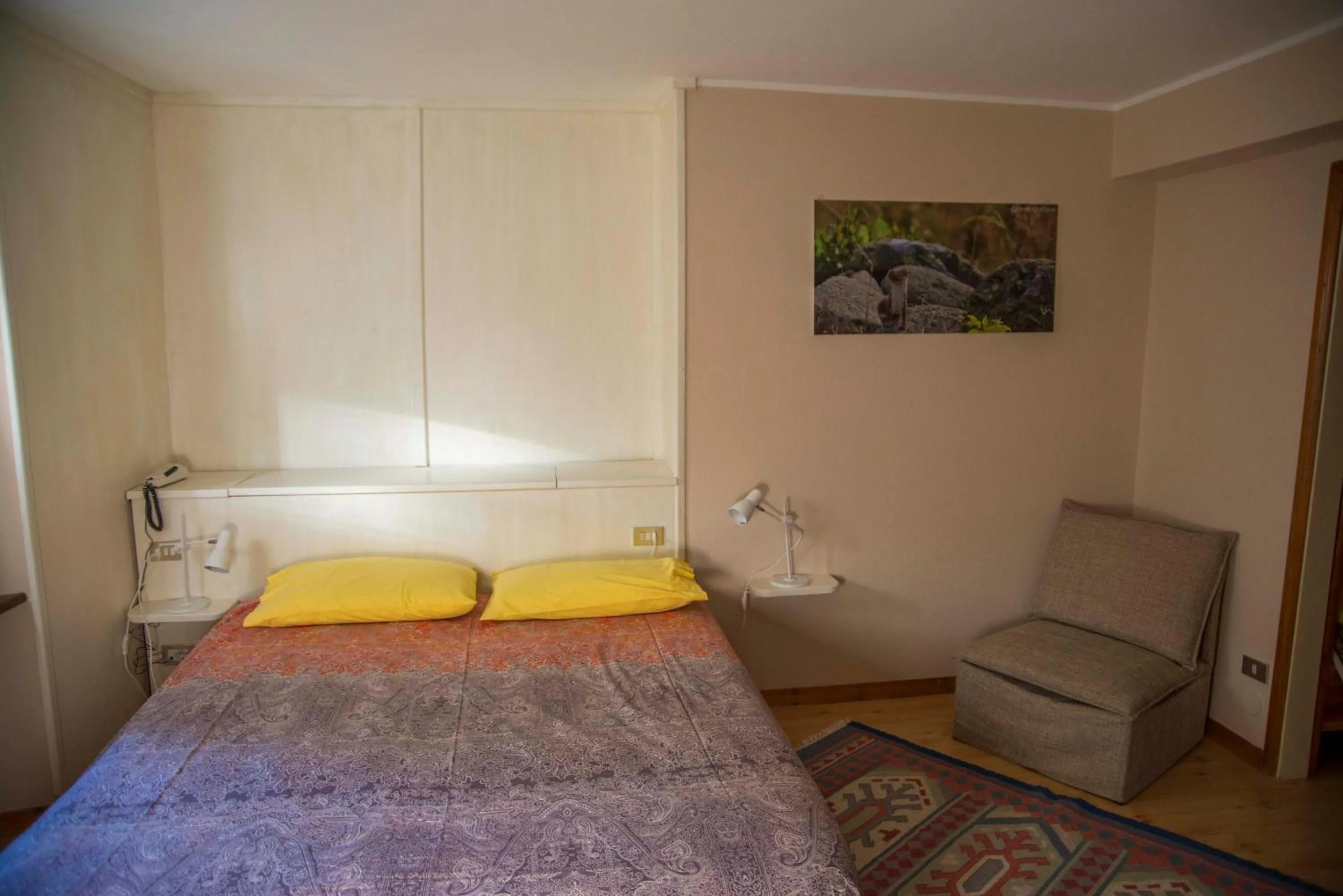Photo of the whole room, Bed in Albergo K2