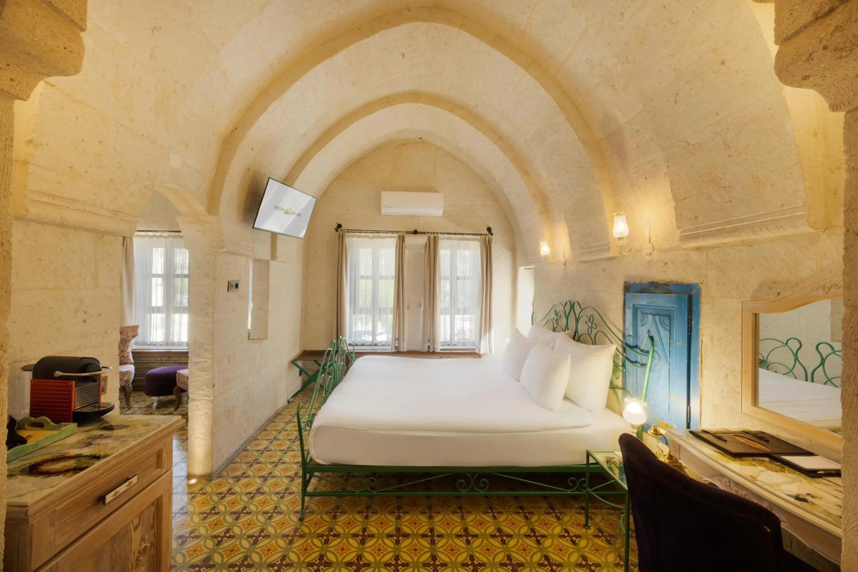 Lobby or reception, Bed in Tafoni Houses Cave Hotel