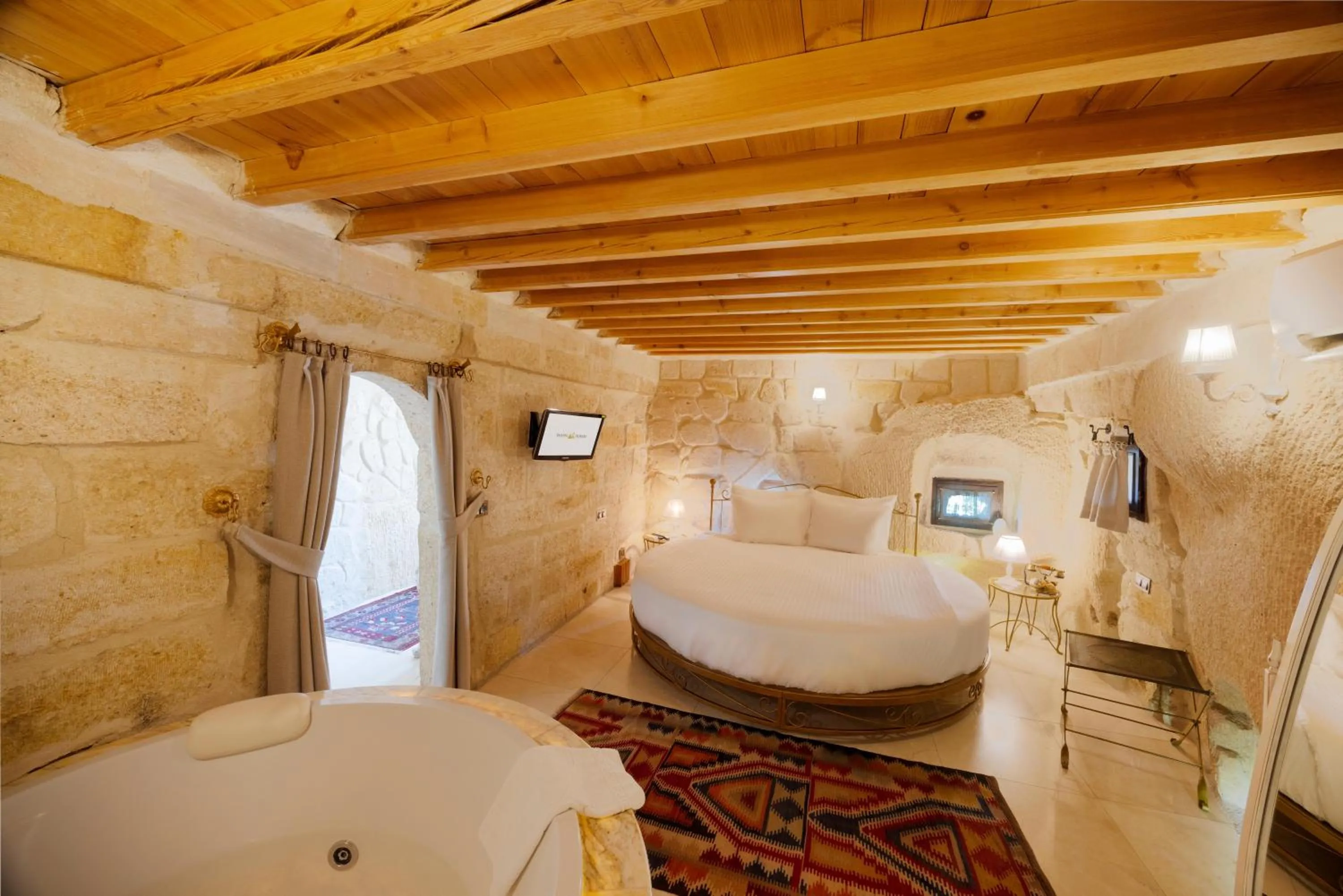 Bathroom, Bed in Tafoni Houses Cave Hotel