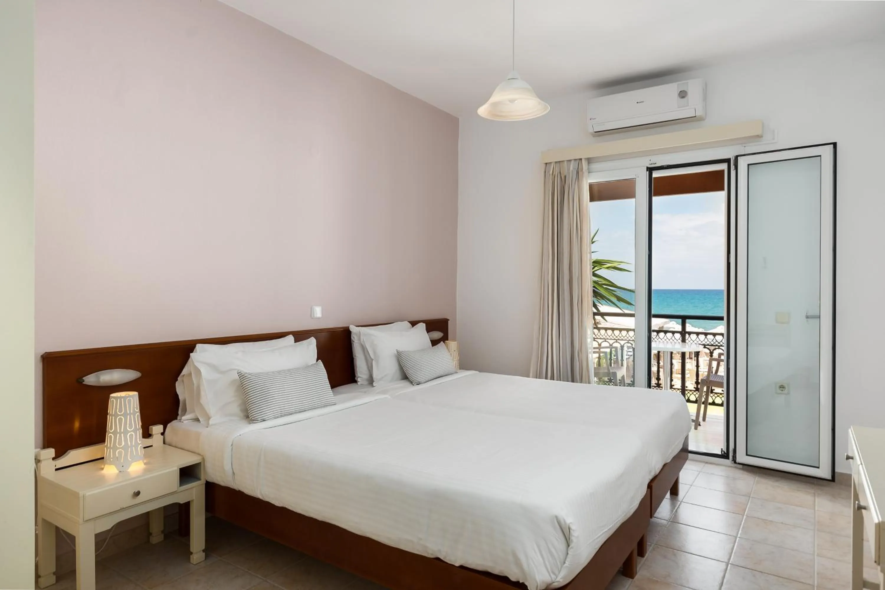 Bed in Filorian Hotel Apartments