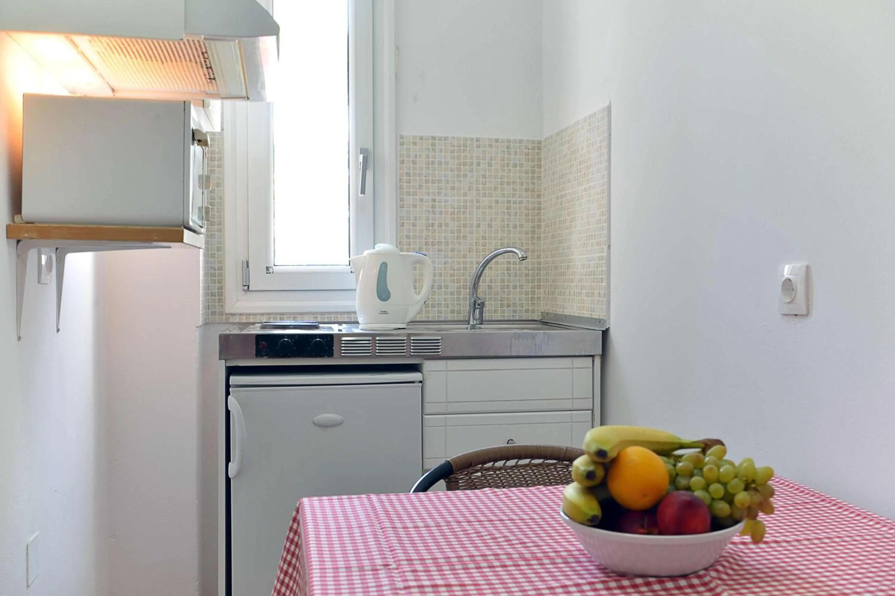 Kitchen or kitchenette in Filorian Hotel Apartments