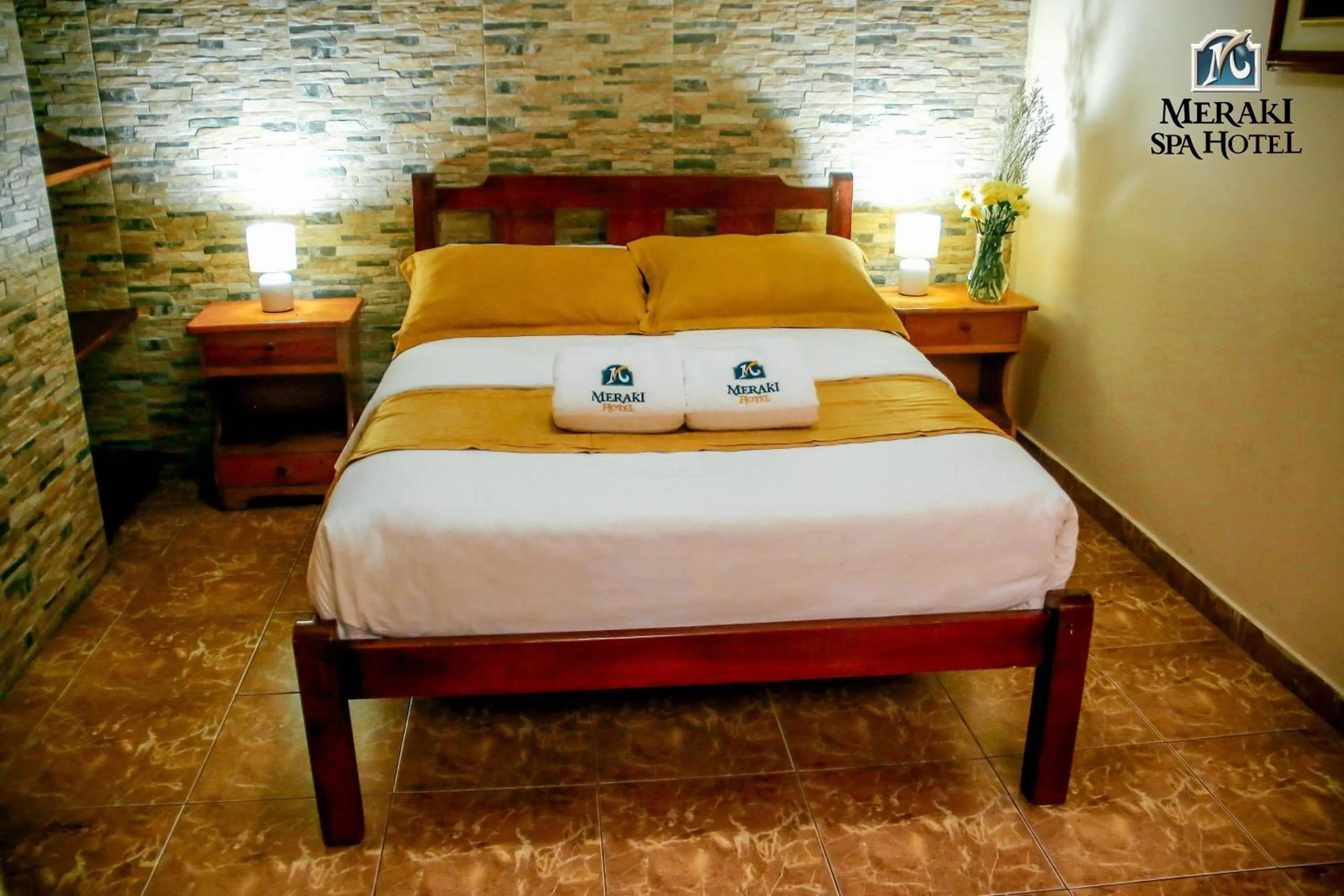 Bed in Meraki Hotel