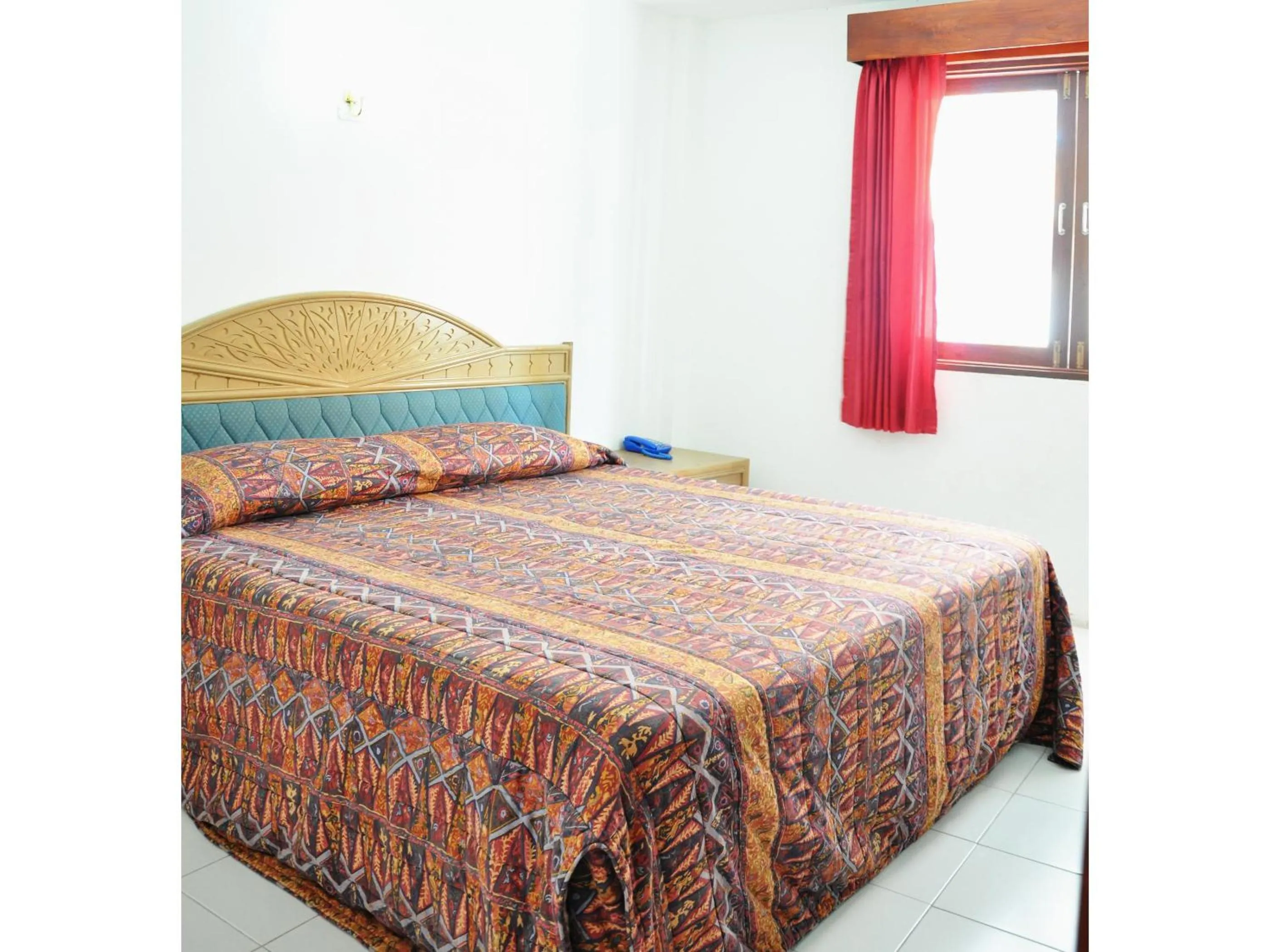 Bed in Highfive Guest House