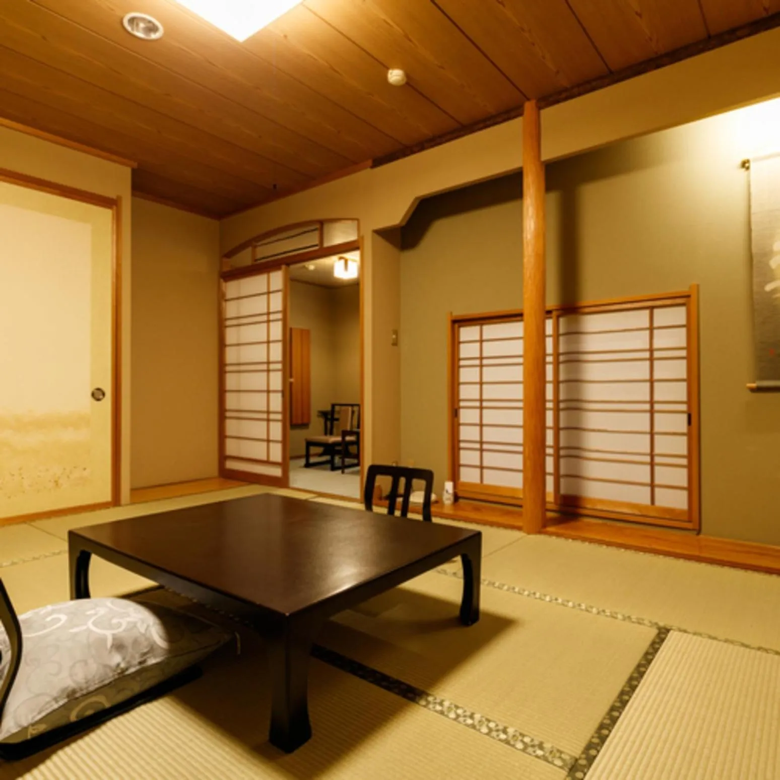 Living room, Bed in Umemura Ryokan Uguisutei