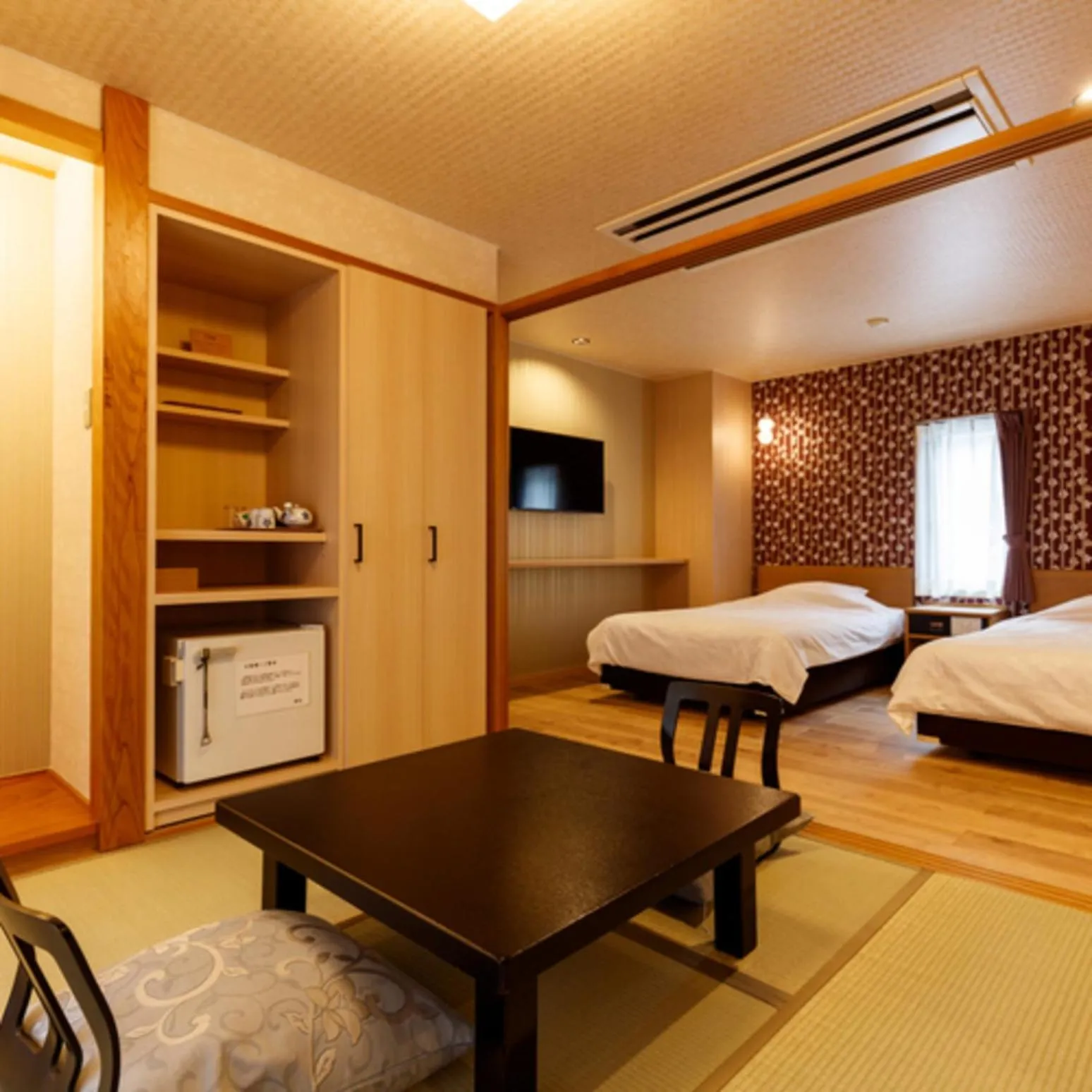 Bed in Umemura Ryokan Uguisutei