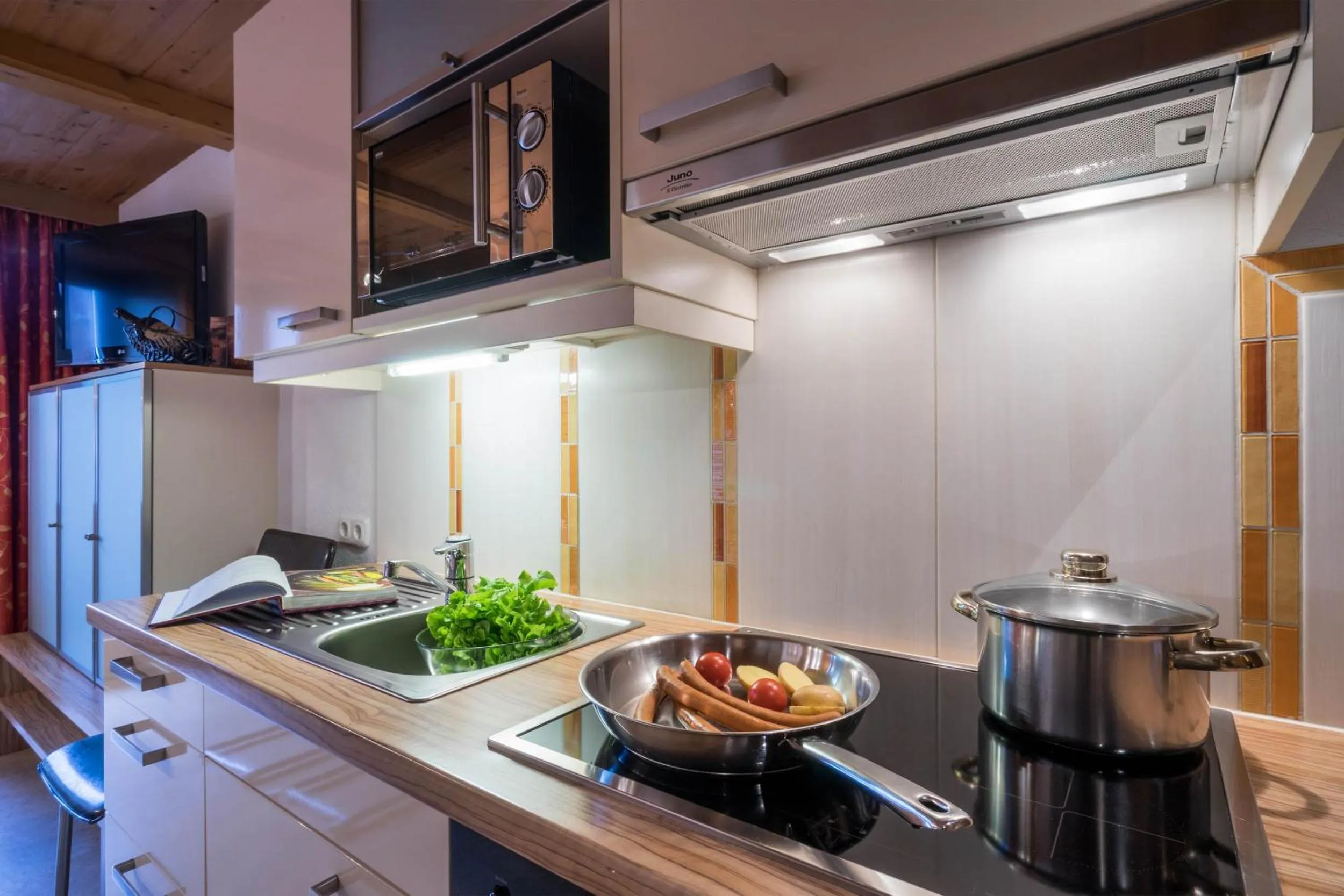 Kitchen or kitchenette in Aparthotel Gallahaus