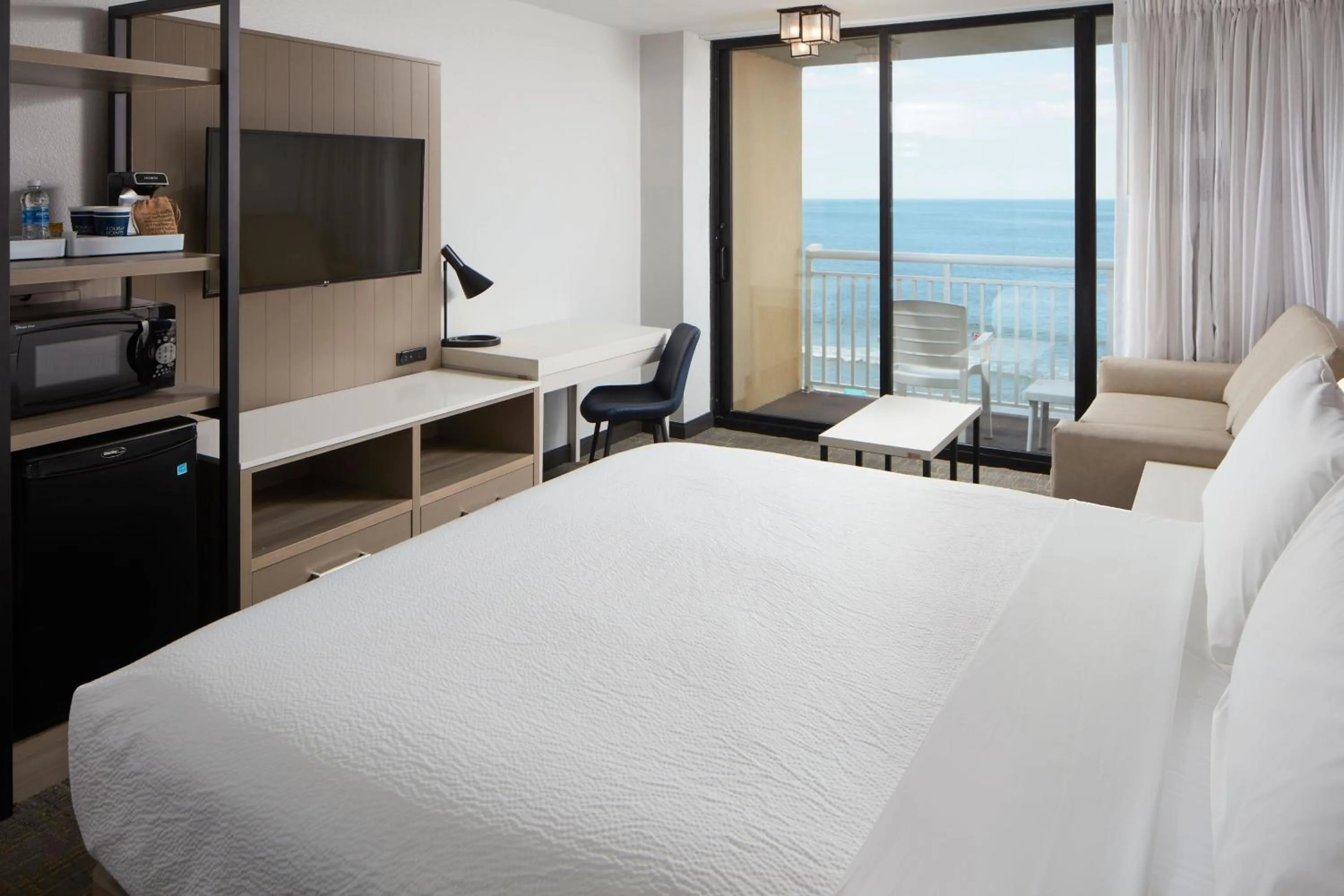 Photo of the whole room, Bed in Four Points by Sheraton Virginia Beach Oceanfront