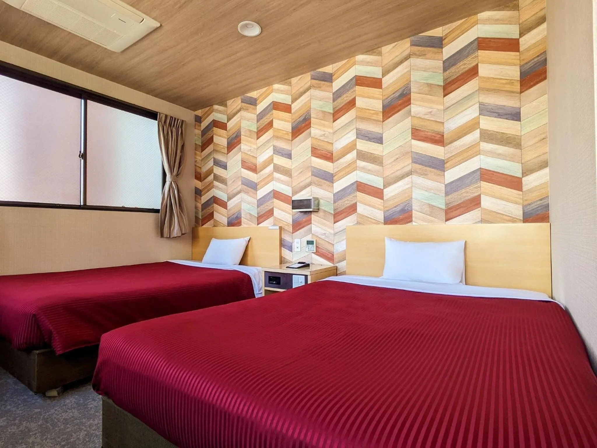 Photo of the whole room, Bed in Hotel New Gaea Yakuin