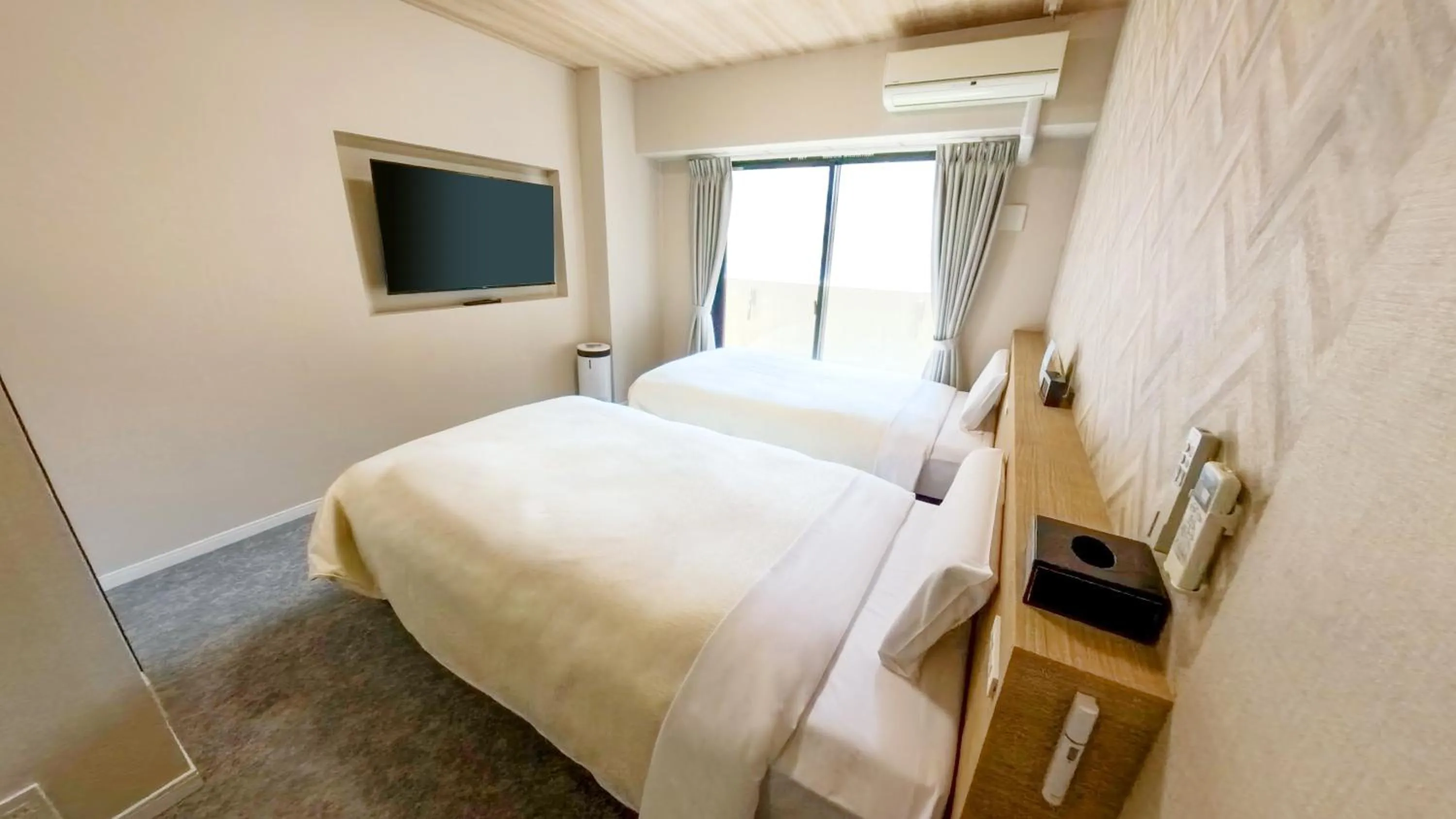 Photo of the whole room, Bed in Hotel New Gaea Yakuin