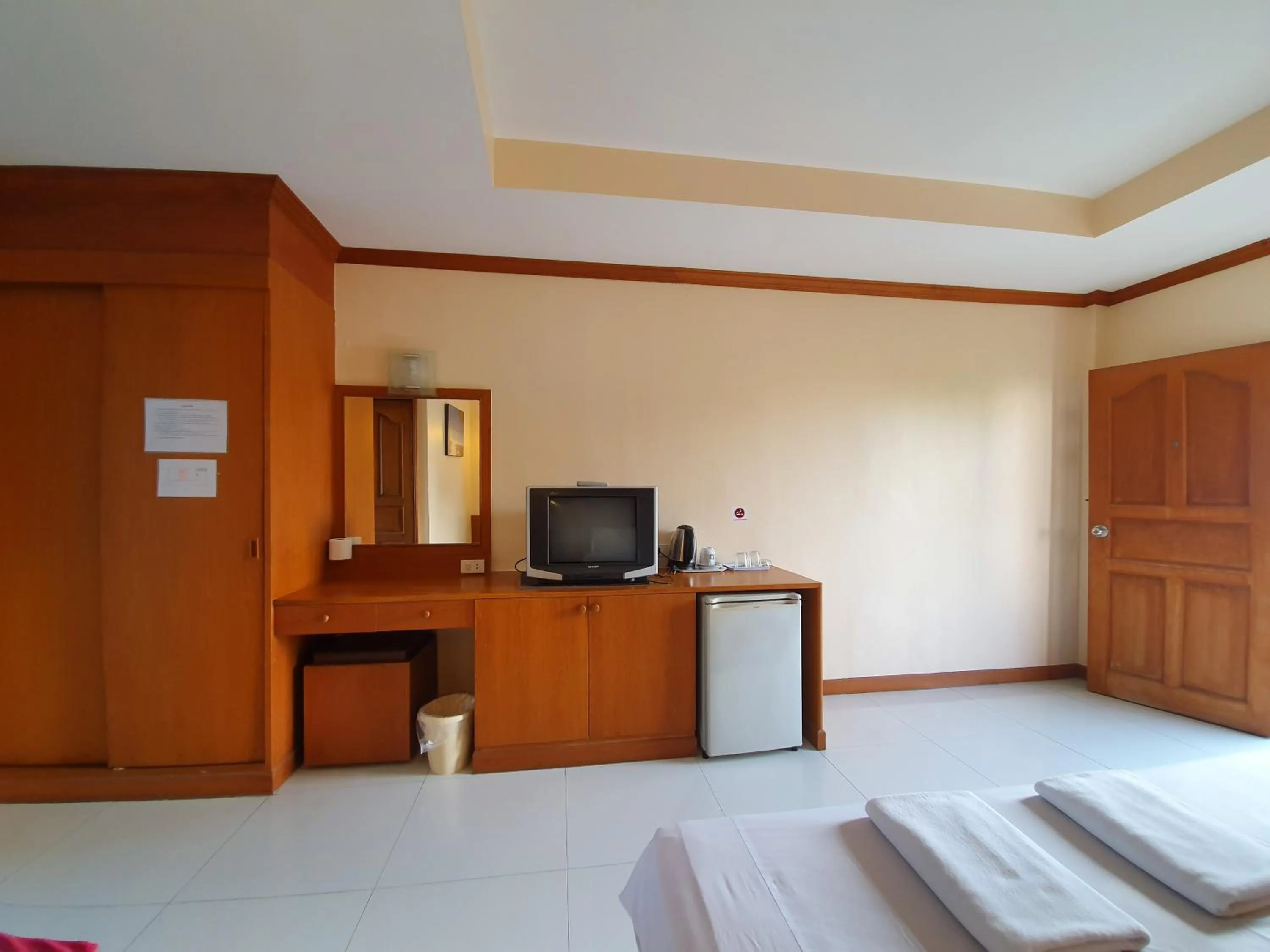 Bed in Baan JPN Hotel