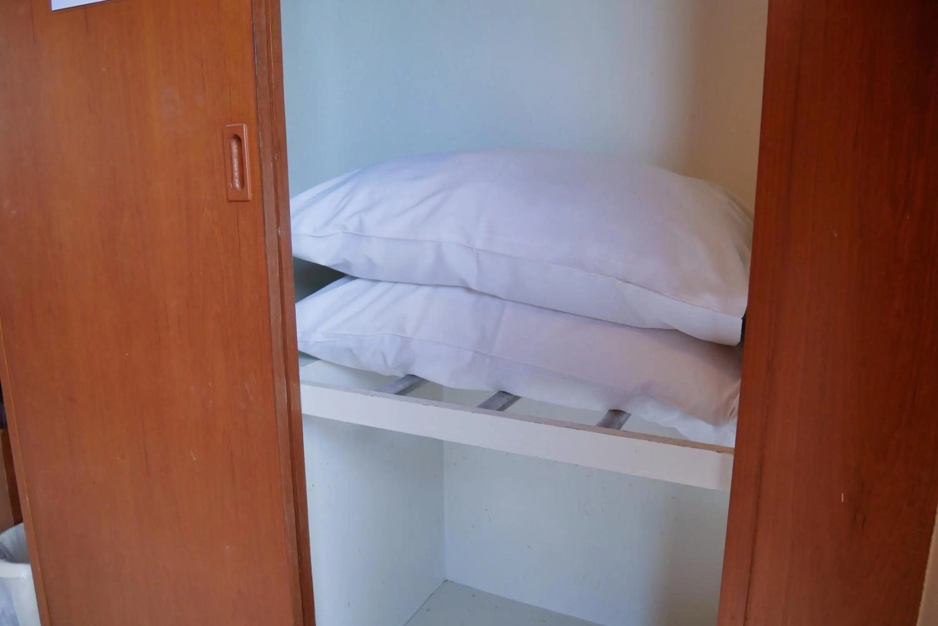 Bed in Baan JPN Hotel