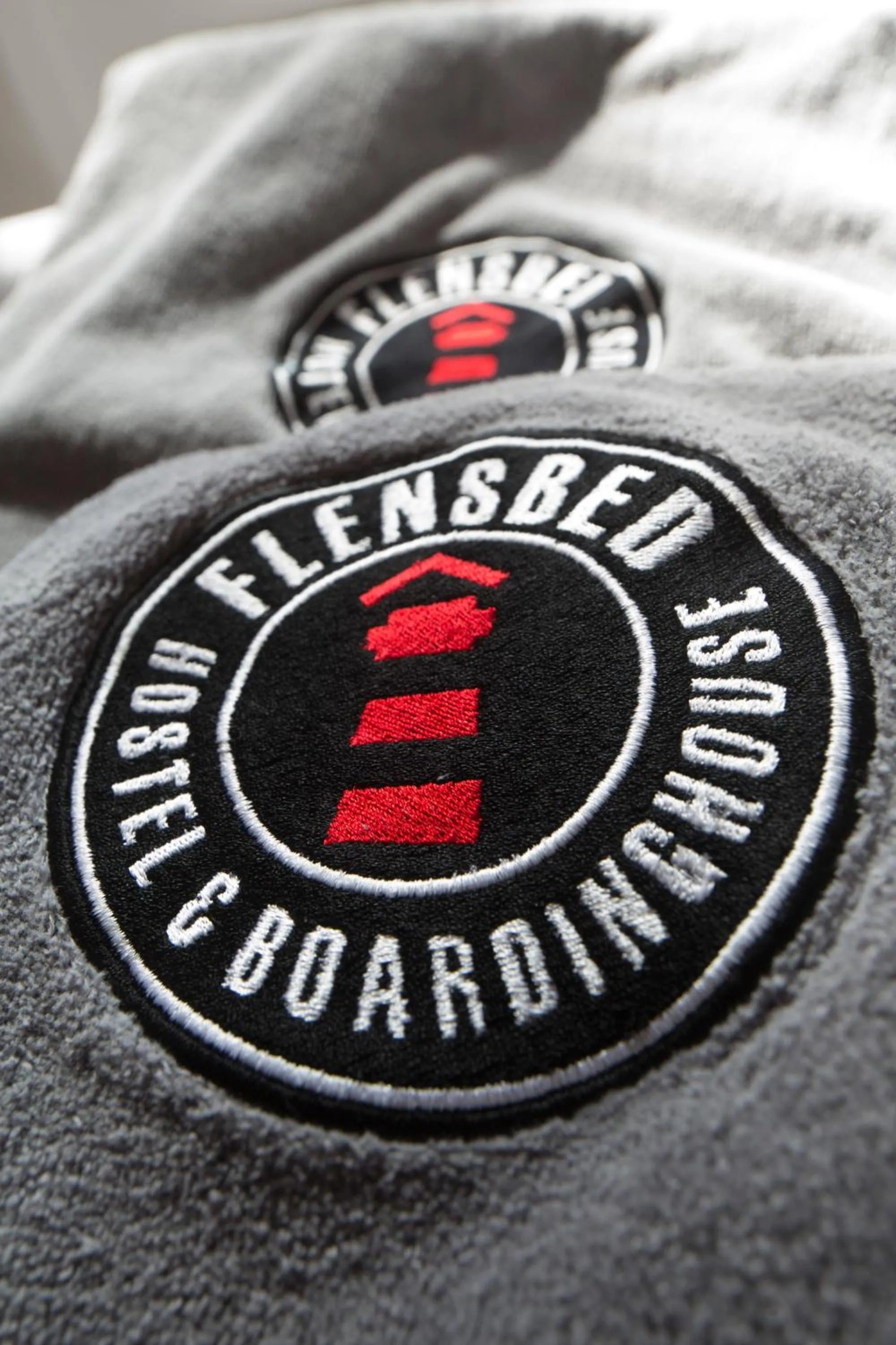 Property logo or sign in Flensbed Hotel & Hostel