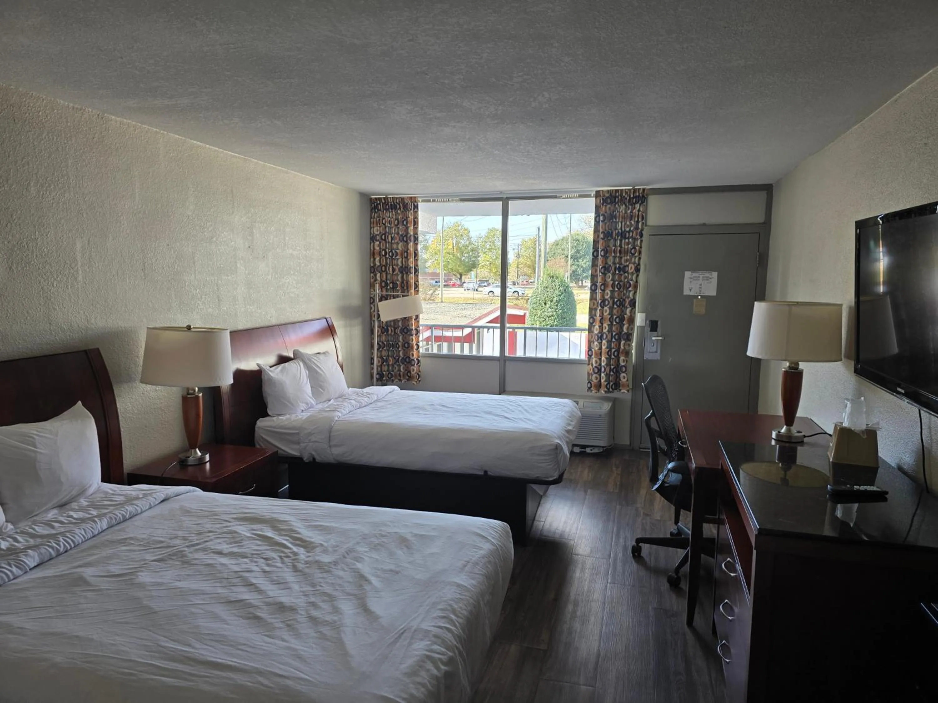 Bedroom in Days Inn by Wyndham Raleigh South