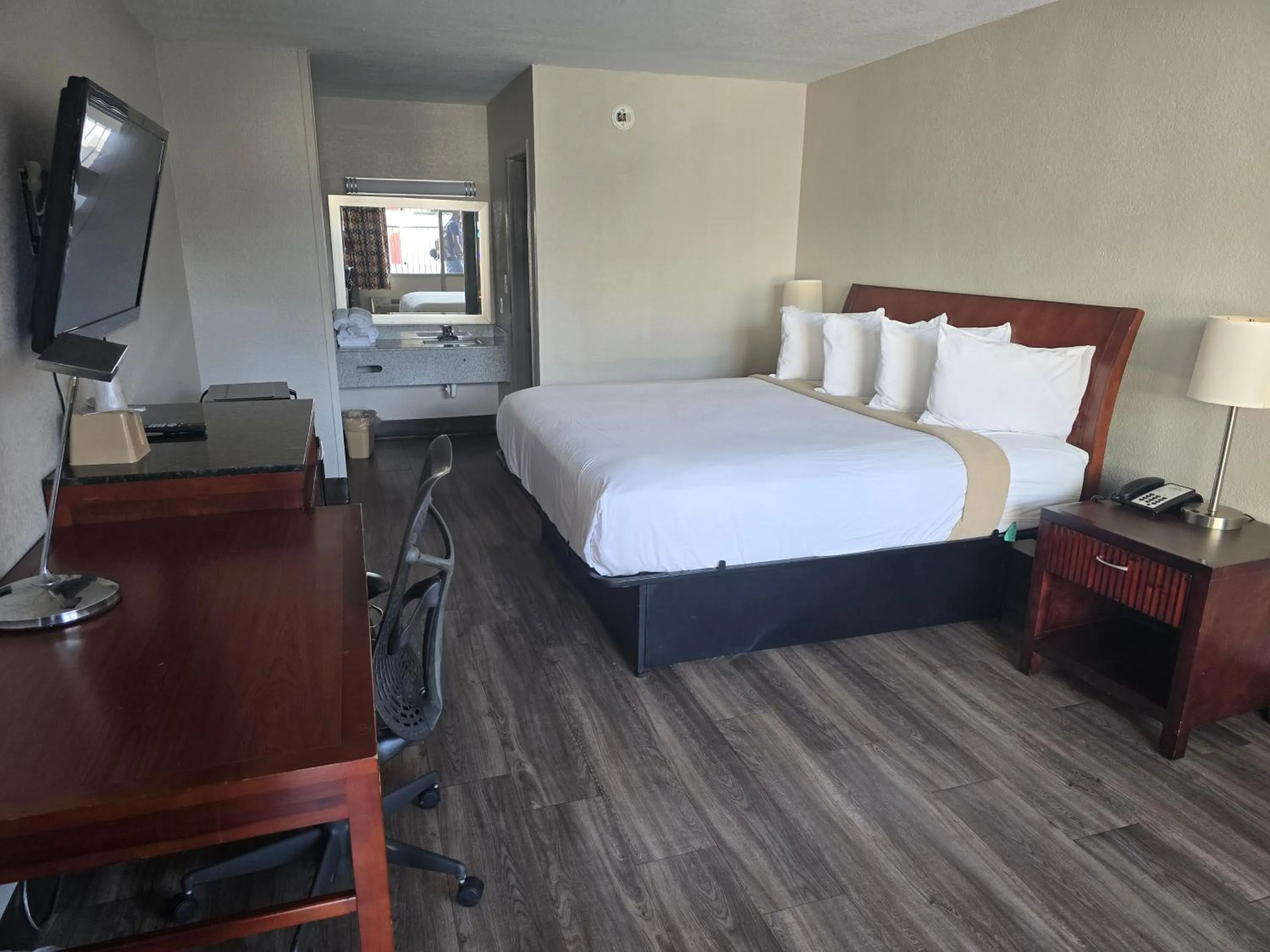 Bedroom in Days Inn by Wyndham Raleigh South