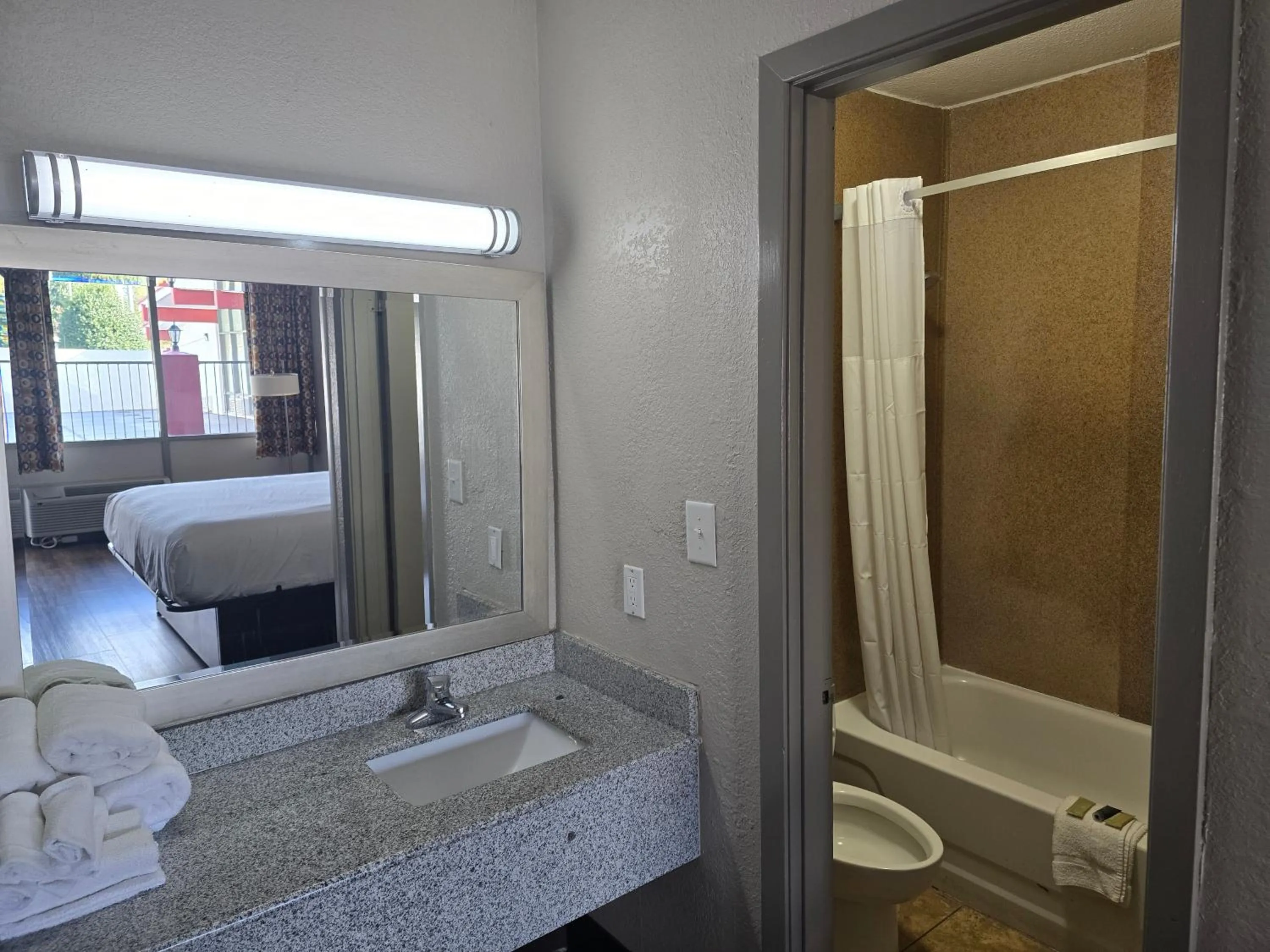 Bed in Days Inn by Wyndham Raleigh South