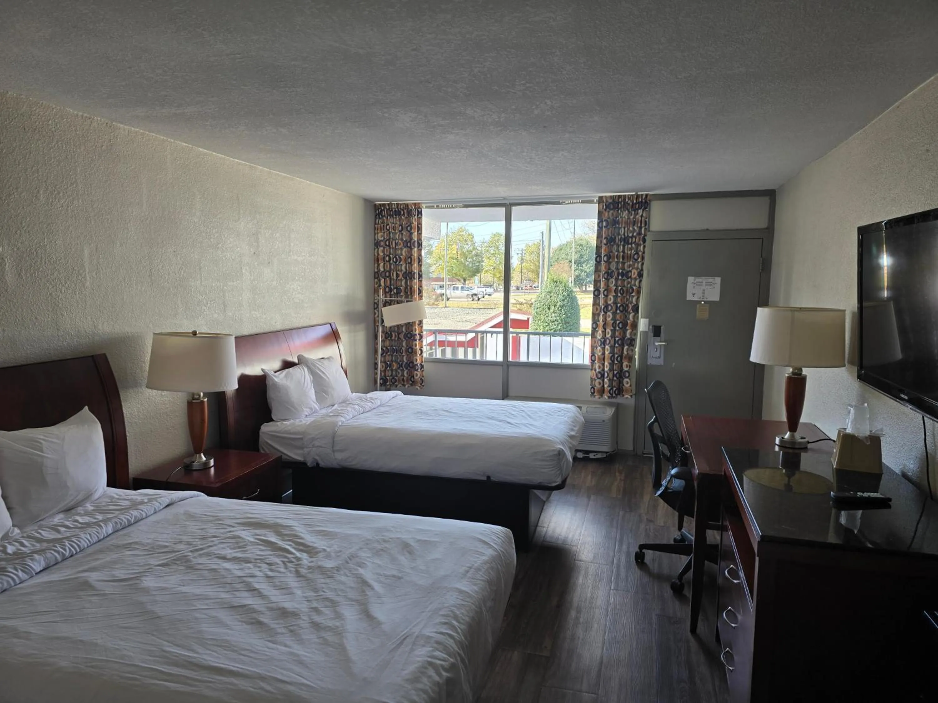 Bedroom in Days Inn by Wyndham Raleigh South