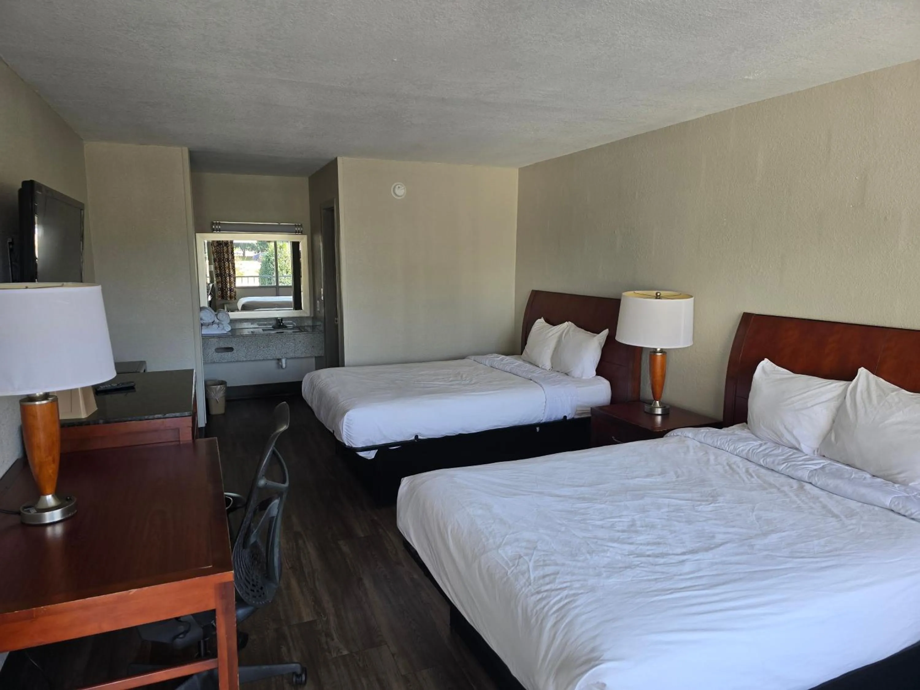 Bedroom in Days Inn by Wyndham Raleigh South