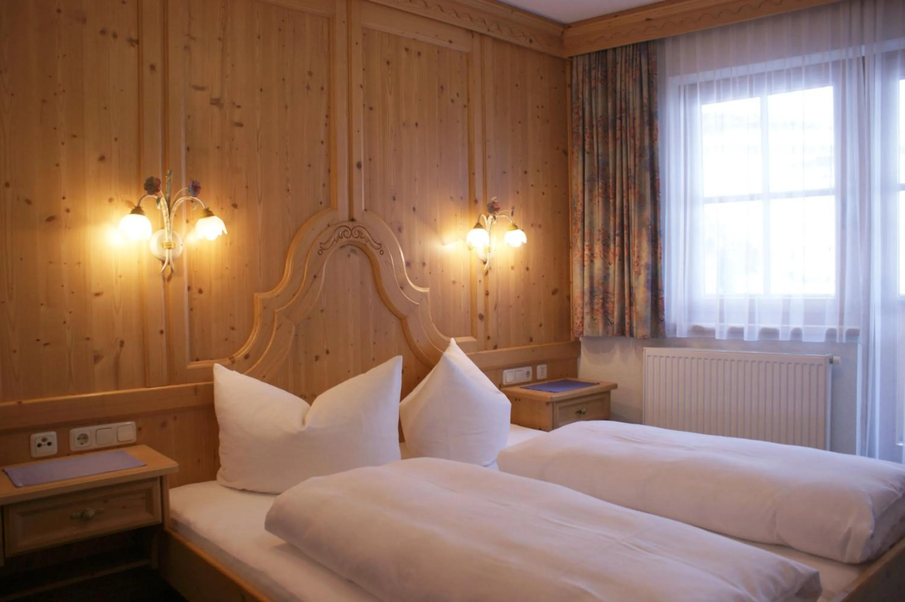 Bed in Sportapart Garni Mallaun