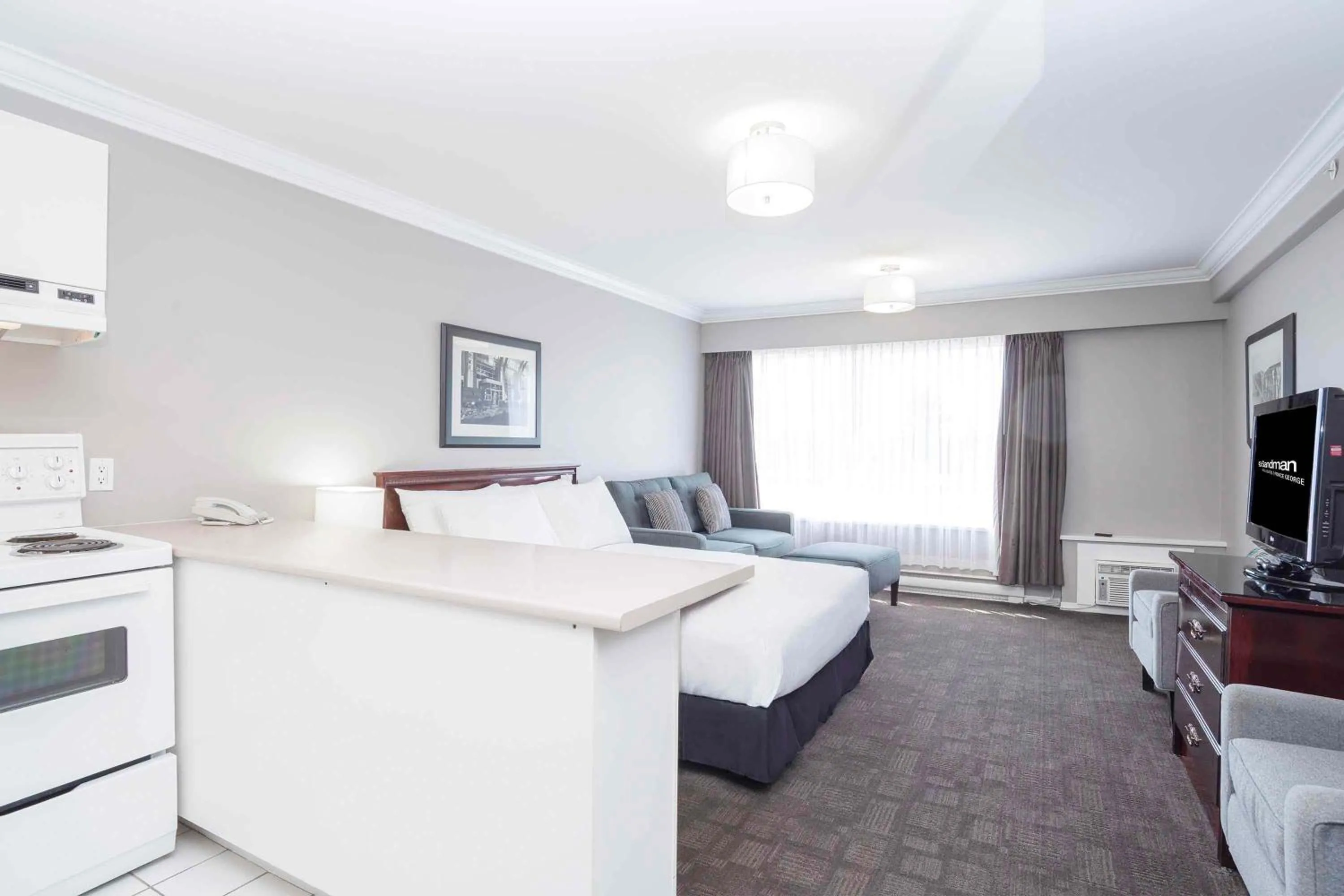 Photo of the whole room, Bed in Sandman Hotel & Suites Prince George