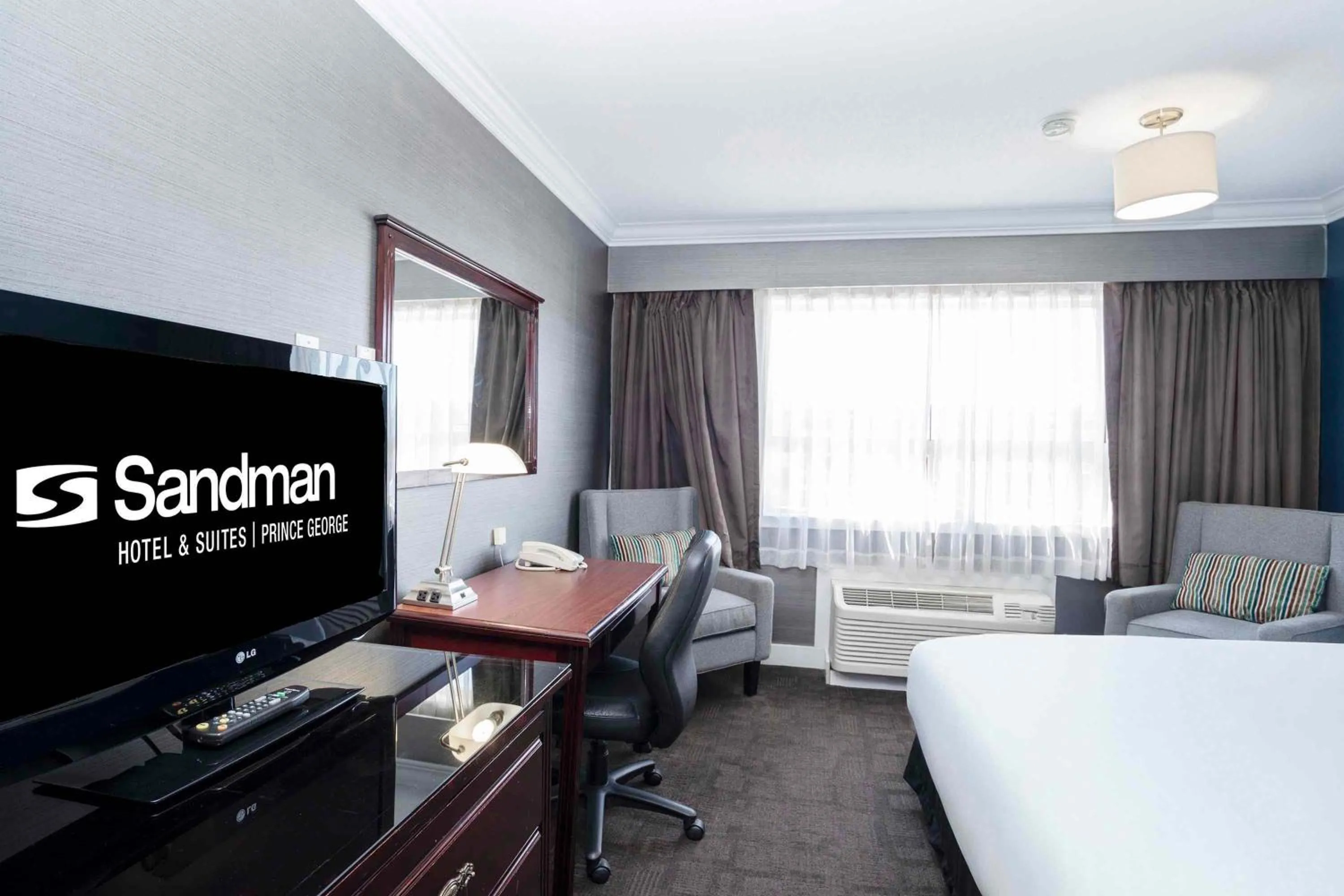 Photo of the whole room, Bed in Sandman Hotel & Suites Prince George