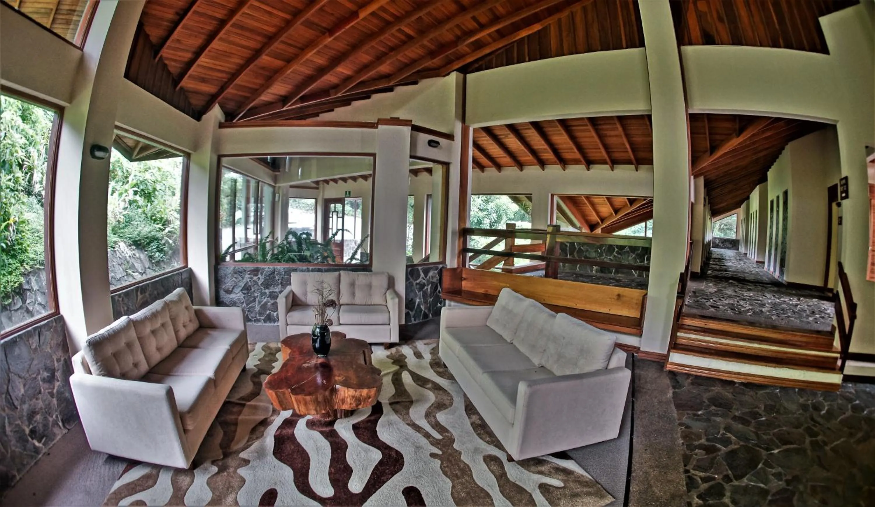 Communal lounge/ TV room in El Establo Mountain Hotel