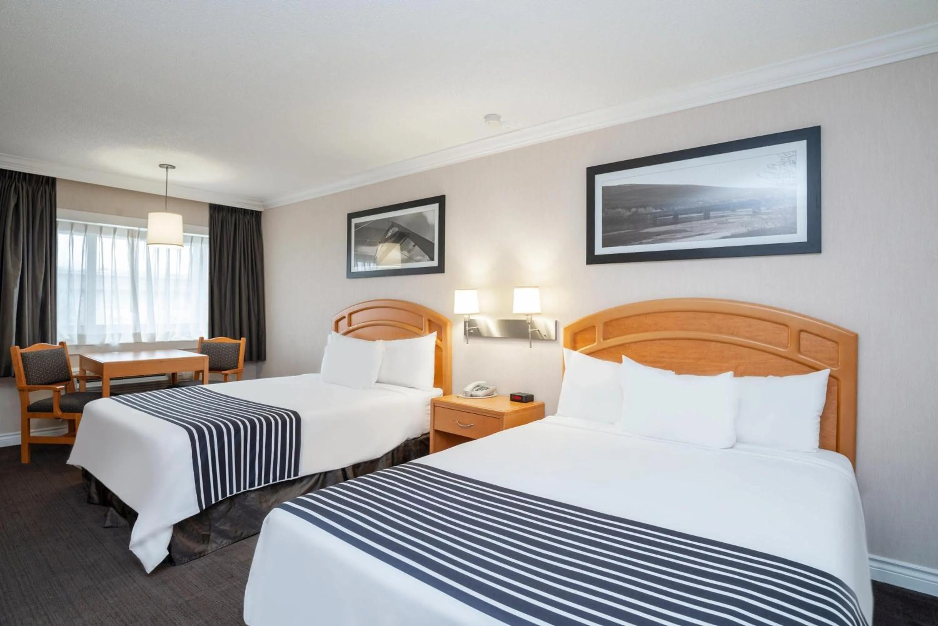 Photo of the whole room, Bed in Sandman Hotel Revelstoke