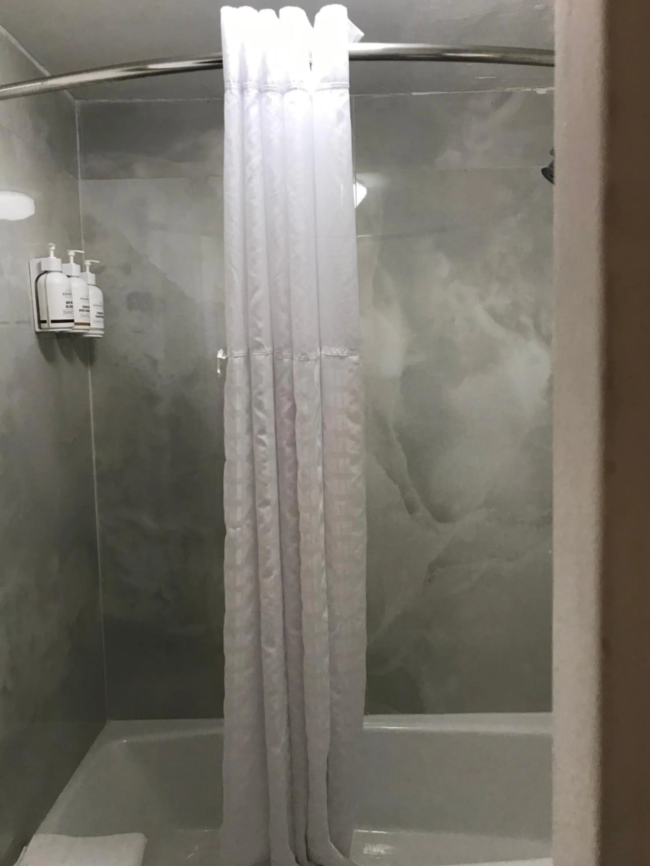 Shower in Ramada by Wyndham Temple Terrace/Tampa North